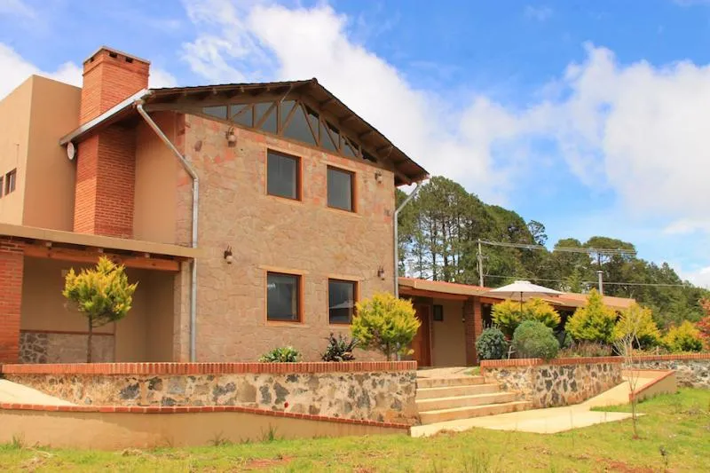 Property building in HOTEL Y CABAÑAS MOUNTAIN LODGE