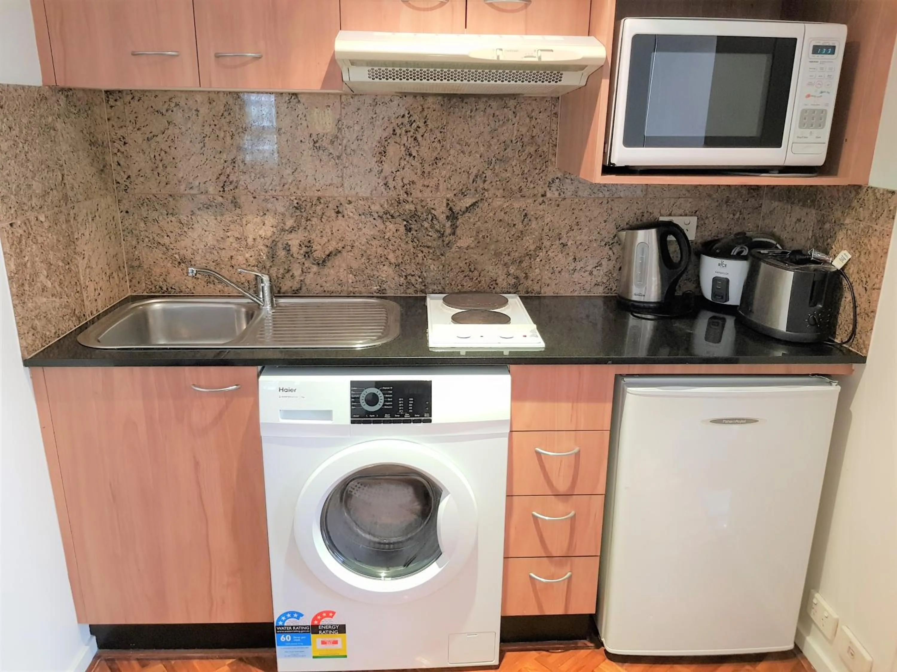 Kitchen or kitchenette in Accommodation Sydney Darling Harbour