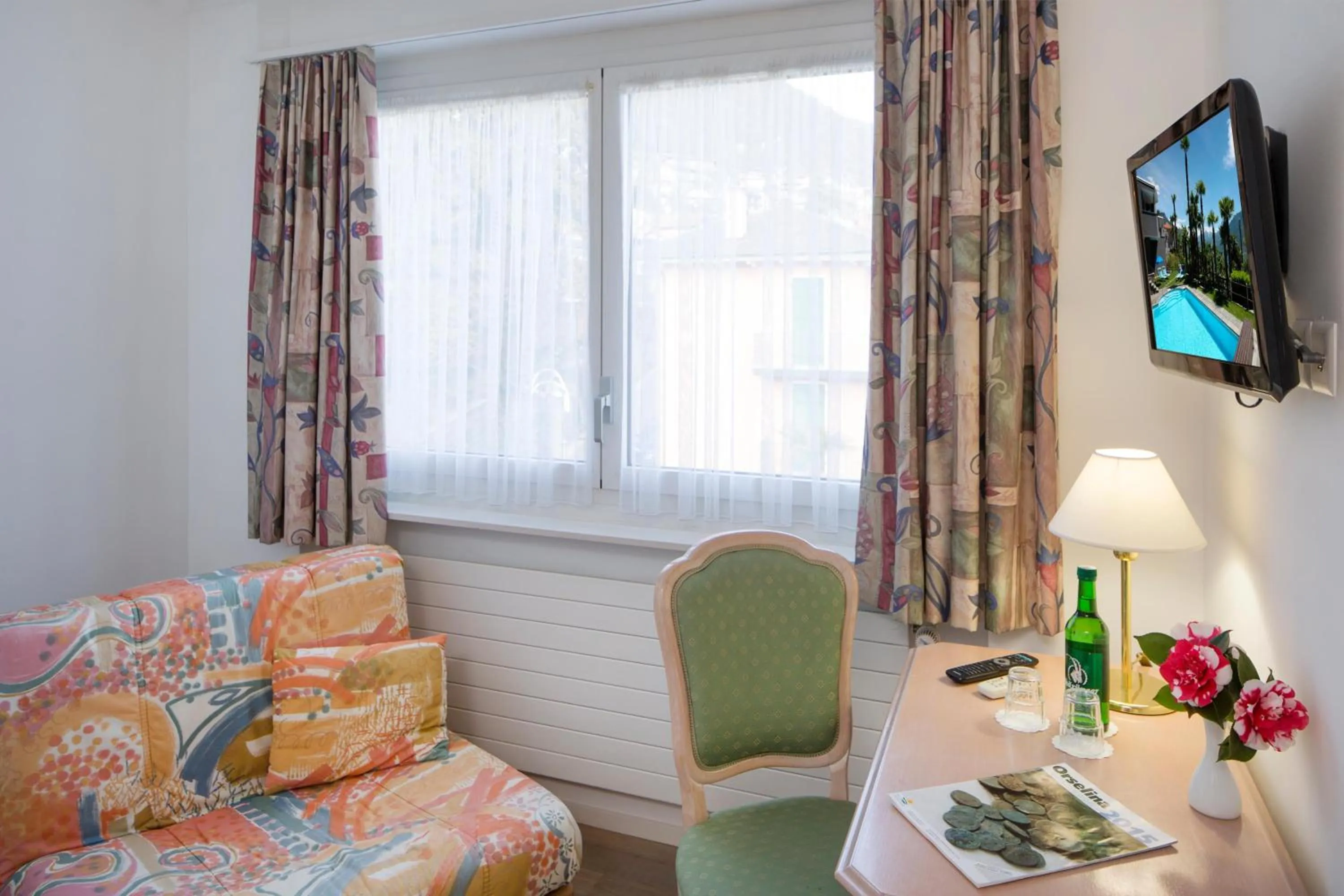 Seating area, Bed in Hotel Stella SA