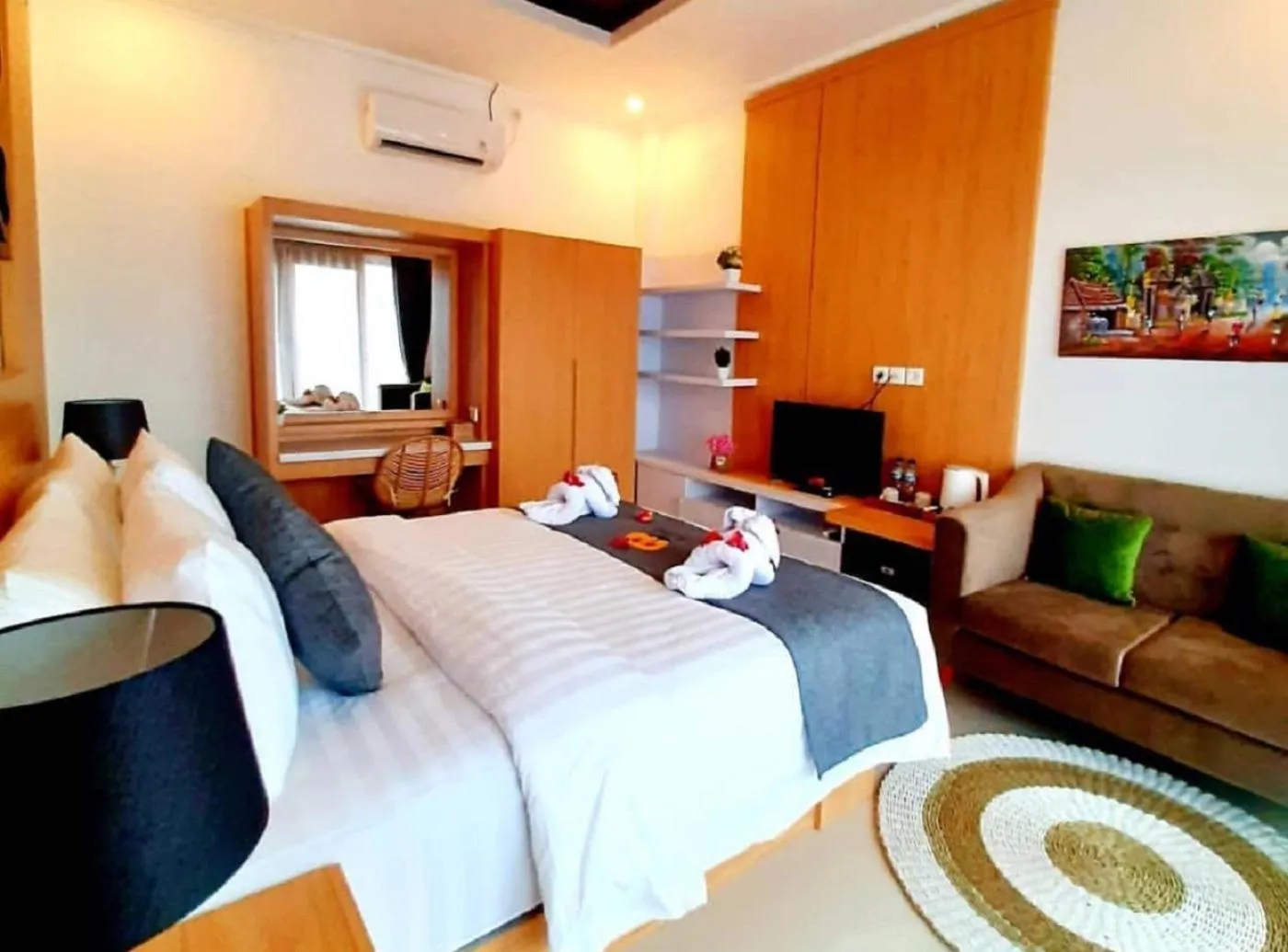 Communal lounge/ TV room, Bed in Sea Terras Suite and Luxury