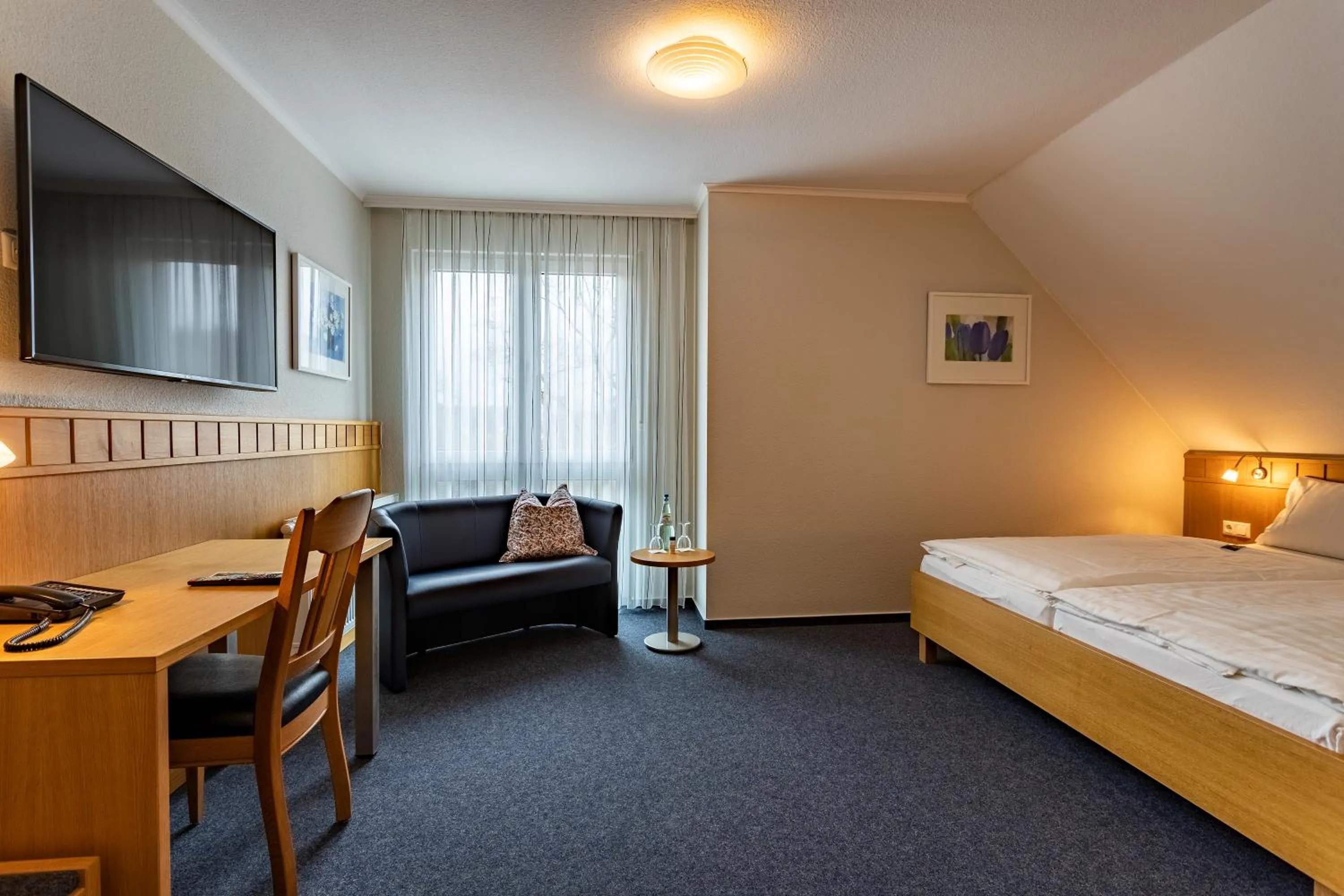 Photo of the whole room, Bed in Dorint Parkhotel Siegen