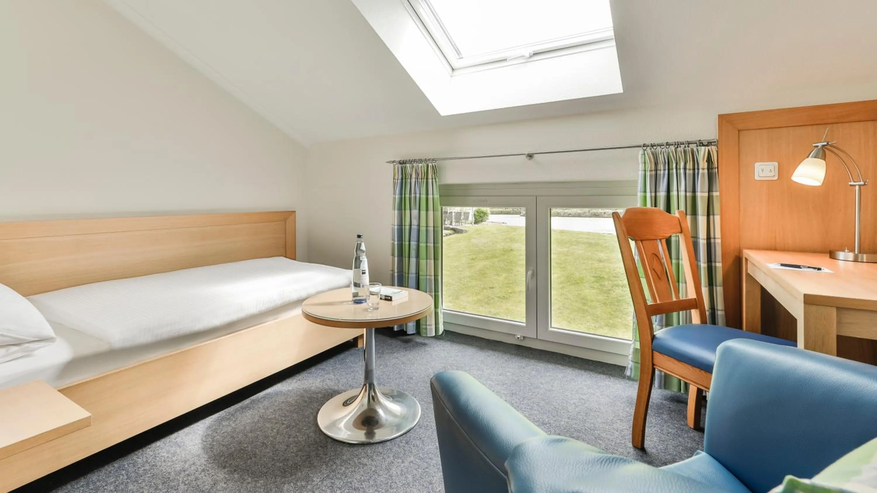 Photo of the whole room, Bed in Dorint Parkhotel Siegen