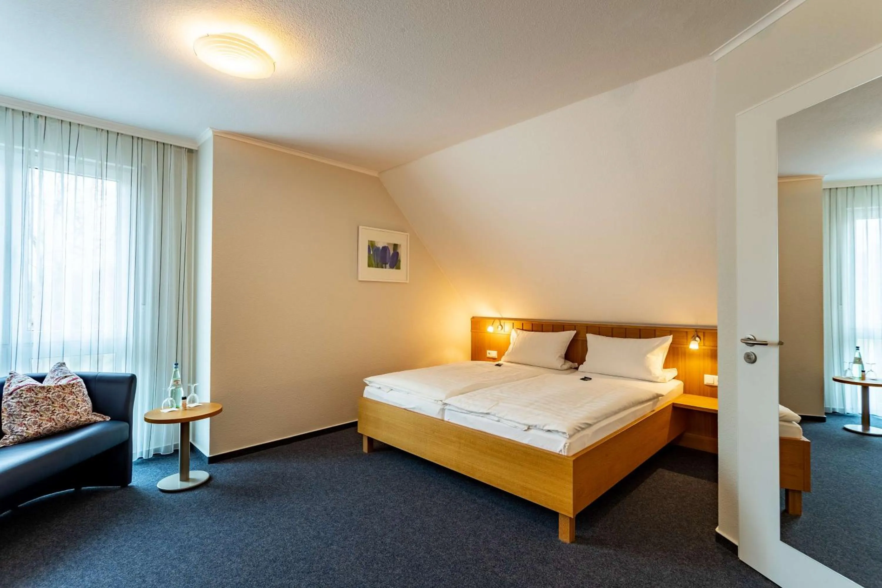 Photo of the whole room, Bed in Dorint Parkhotel Siegen