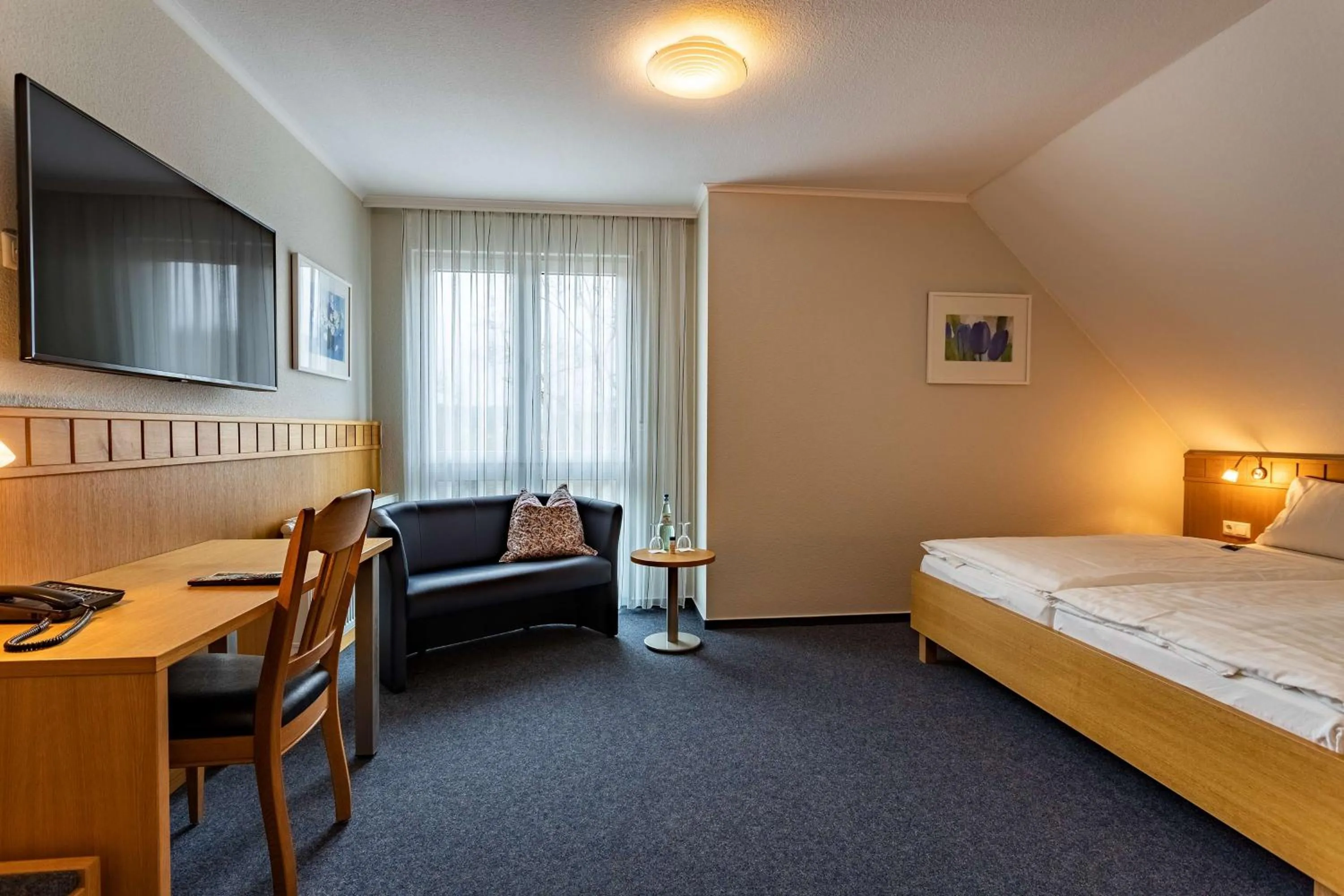 Photo of the whole room, Bed in Dorint Parkhotel Siegen