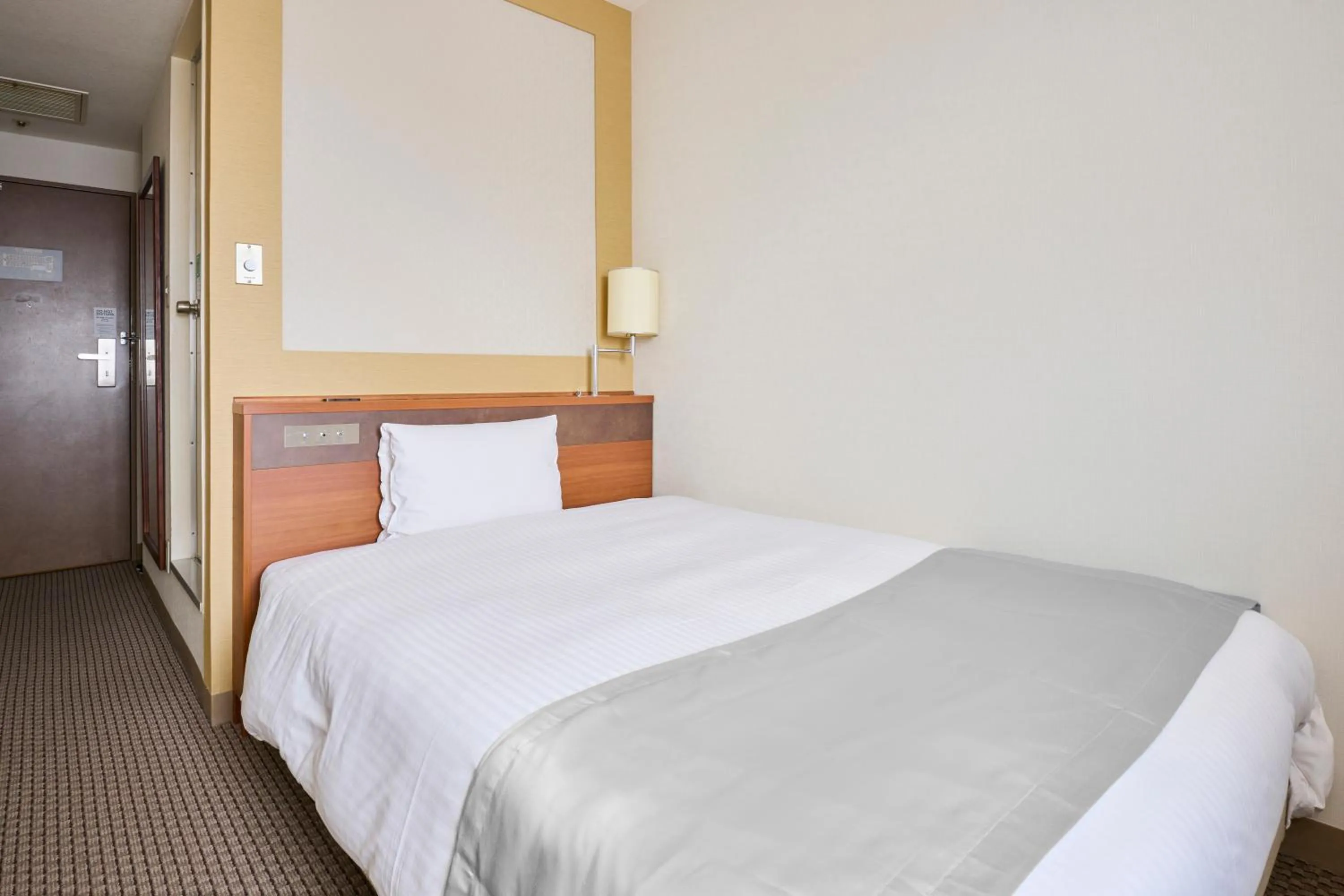 Bed in Vessel Inn Yachiyo Katsudai Station