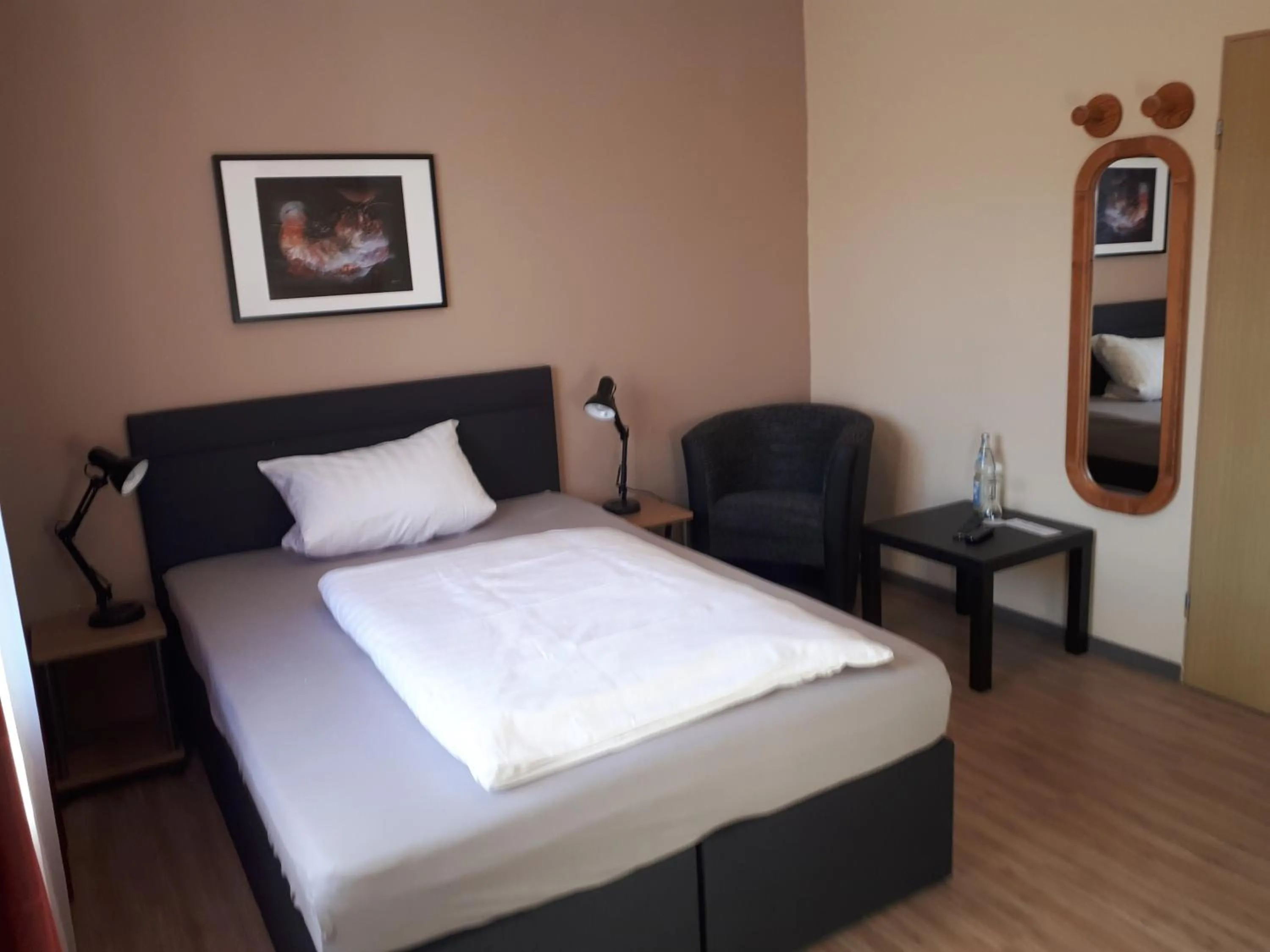 Bed in Hotel Restaurant Denis