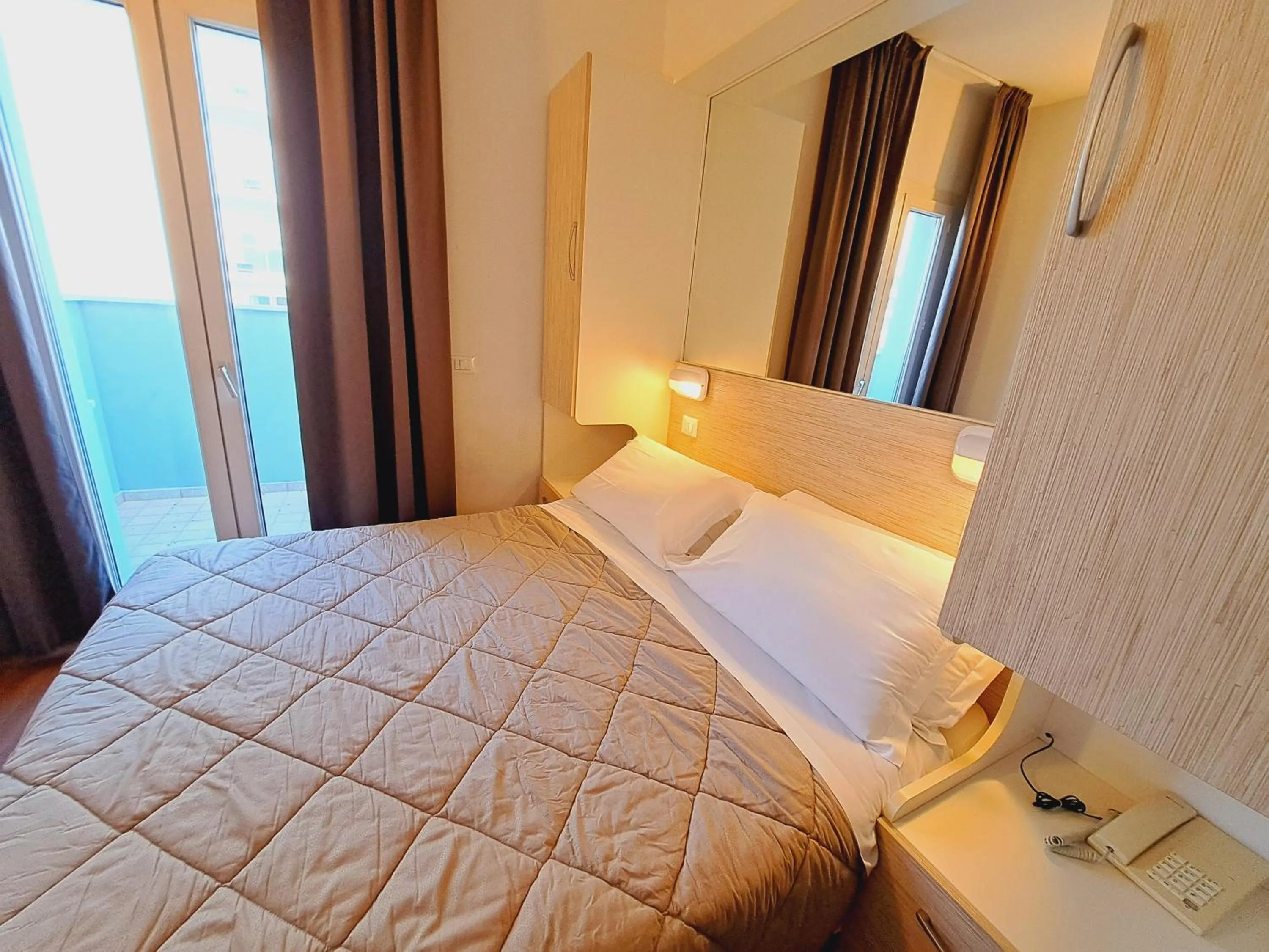 Bed in Hotel Butterfly Wellness & Spa