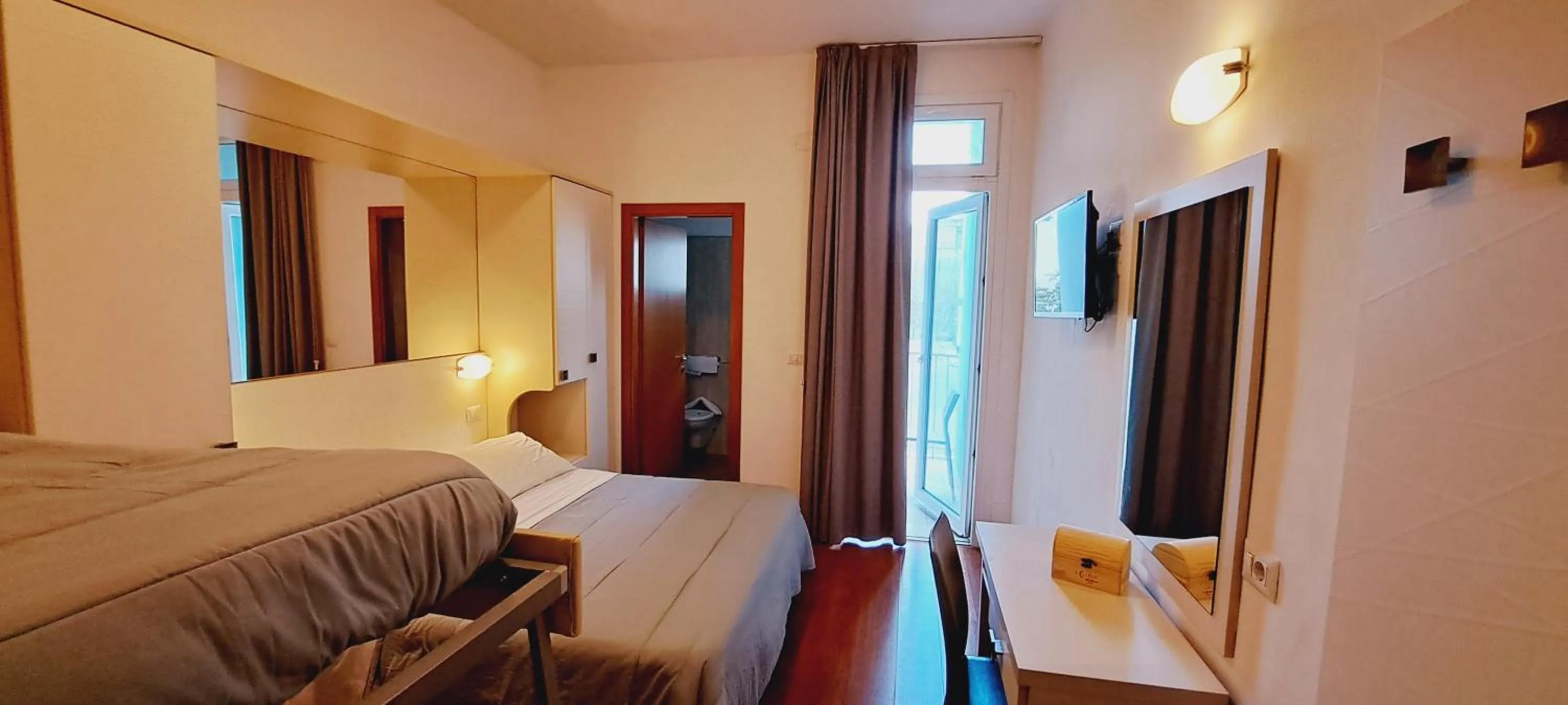 Bed in Hotel Butterfly Wellness & Spa