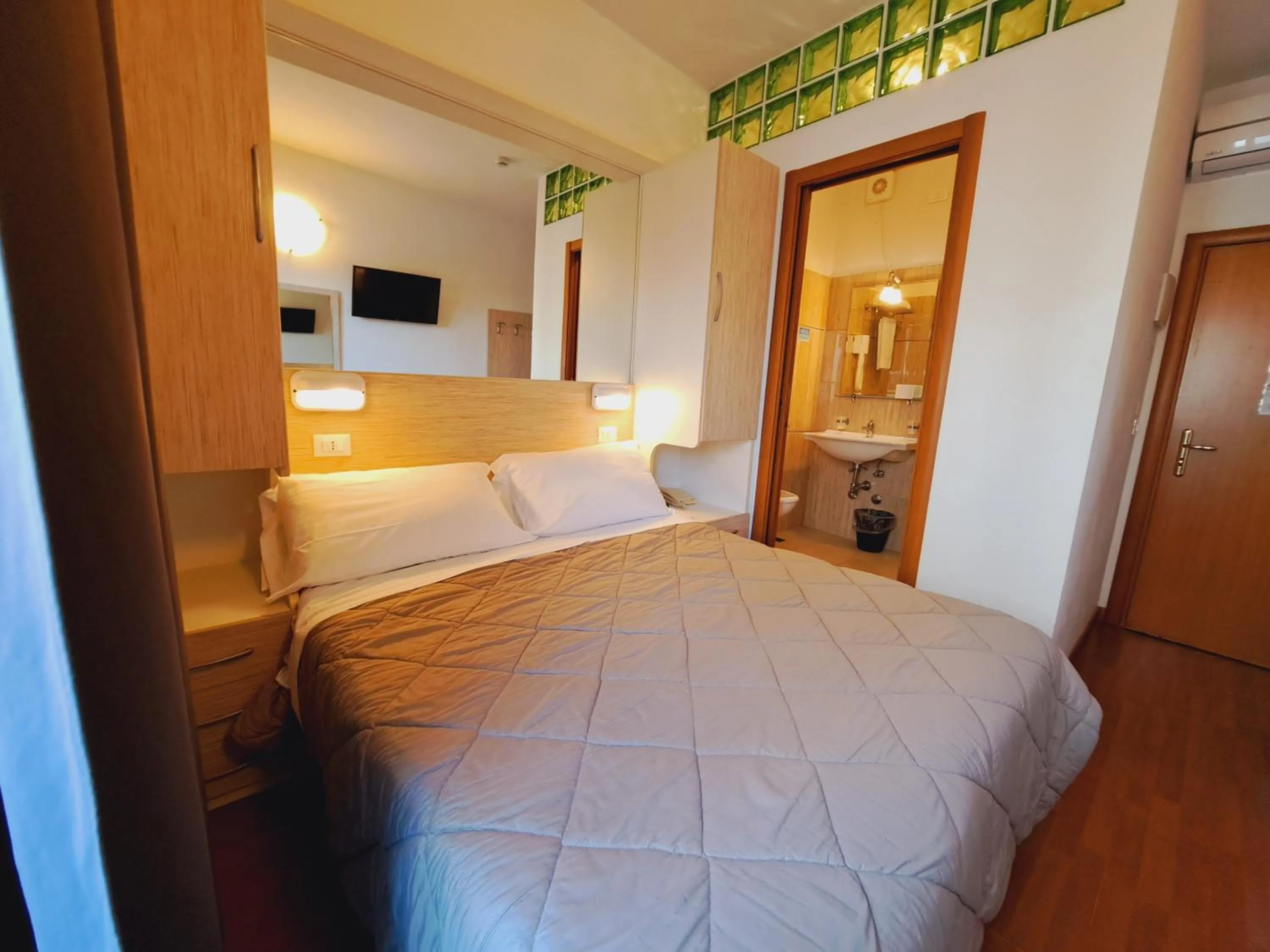 Bed in Hotel Butterfly Wellness & Spa