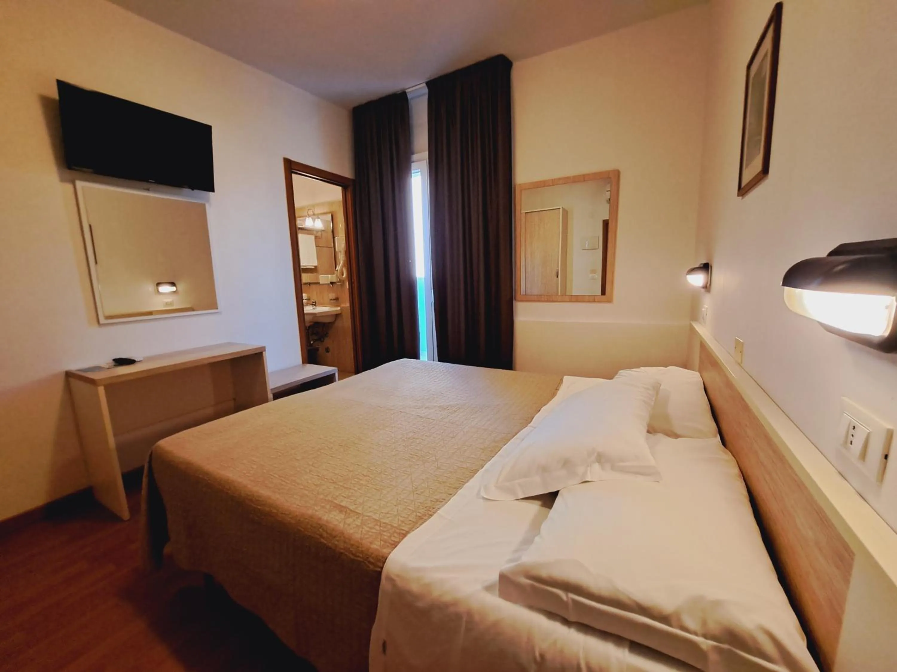 Bed in Hotel Butterfly Wellness & Spa