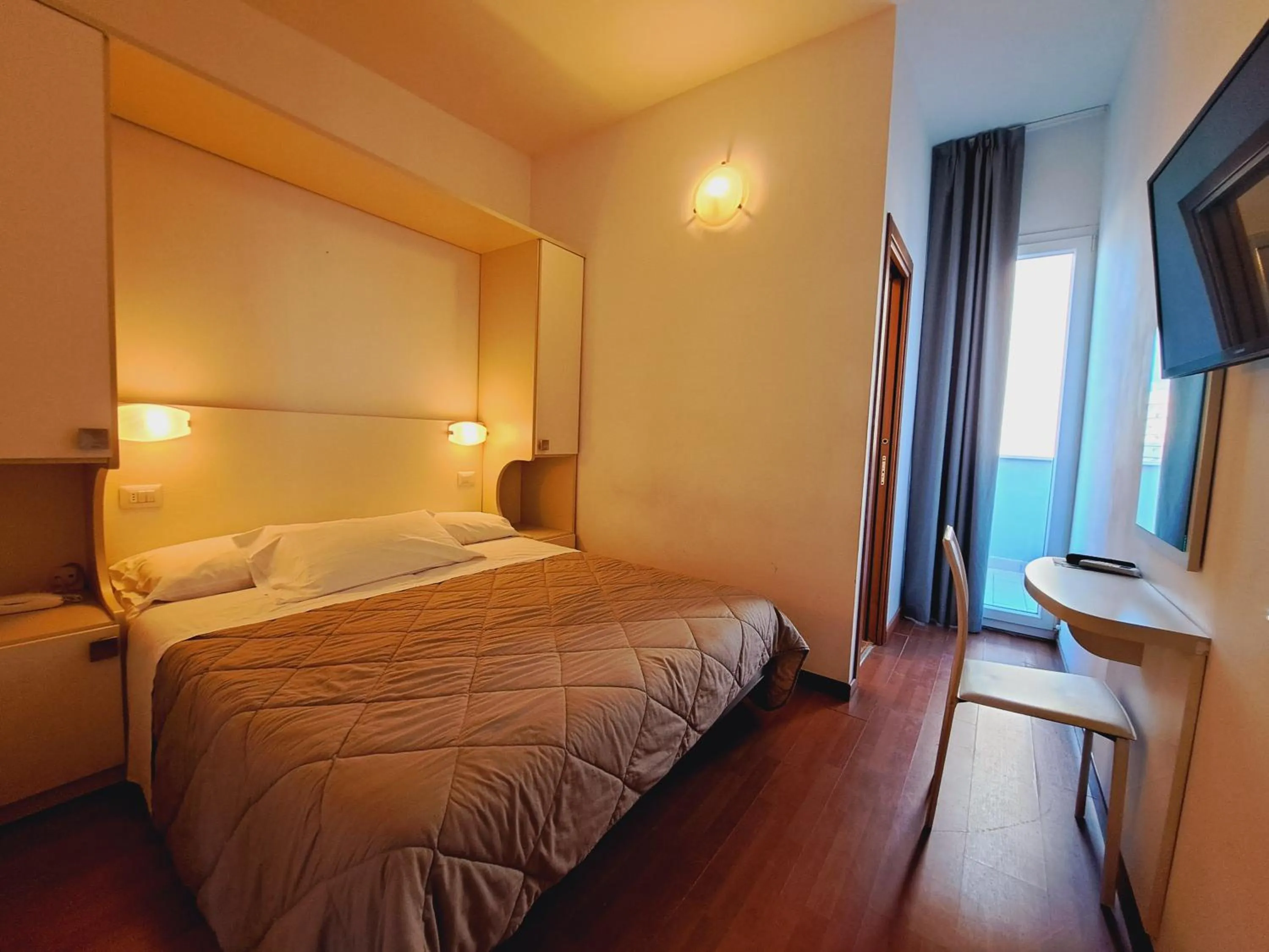 Bed in Hotel Butterfly Wellness & Spa