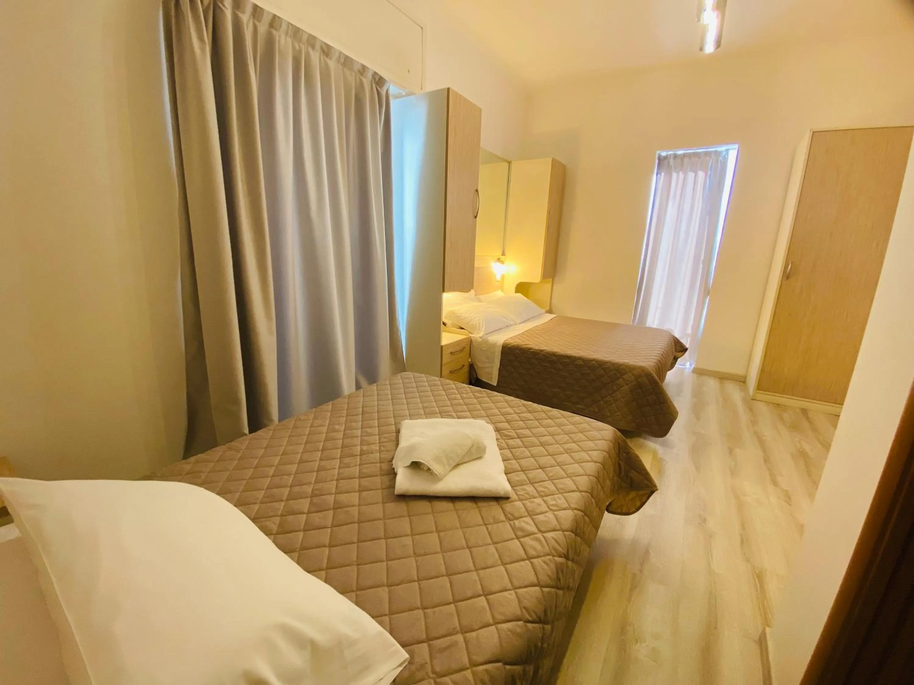 Bed in Hotel Butterfly Wellness & Spa