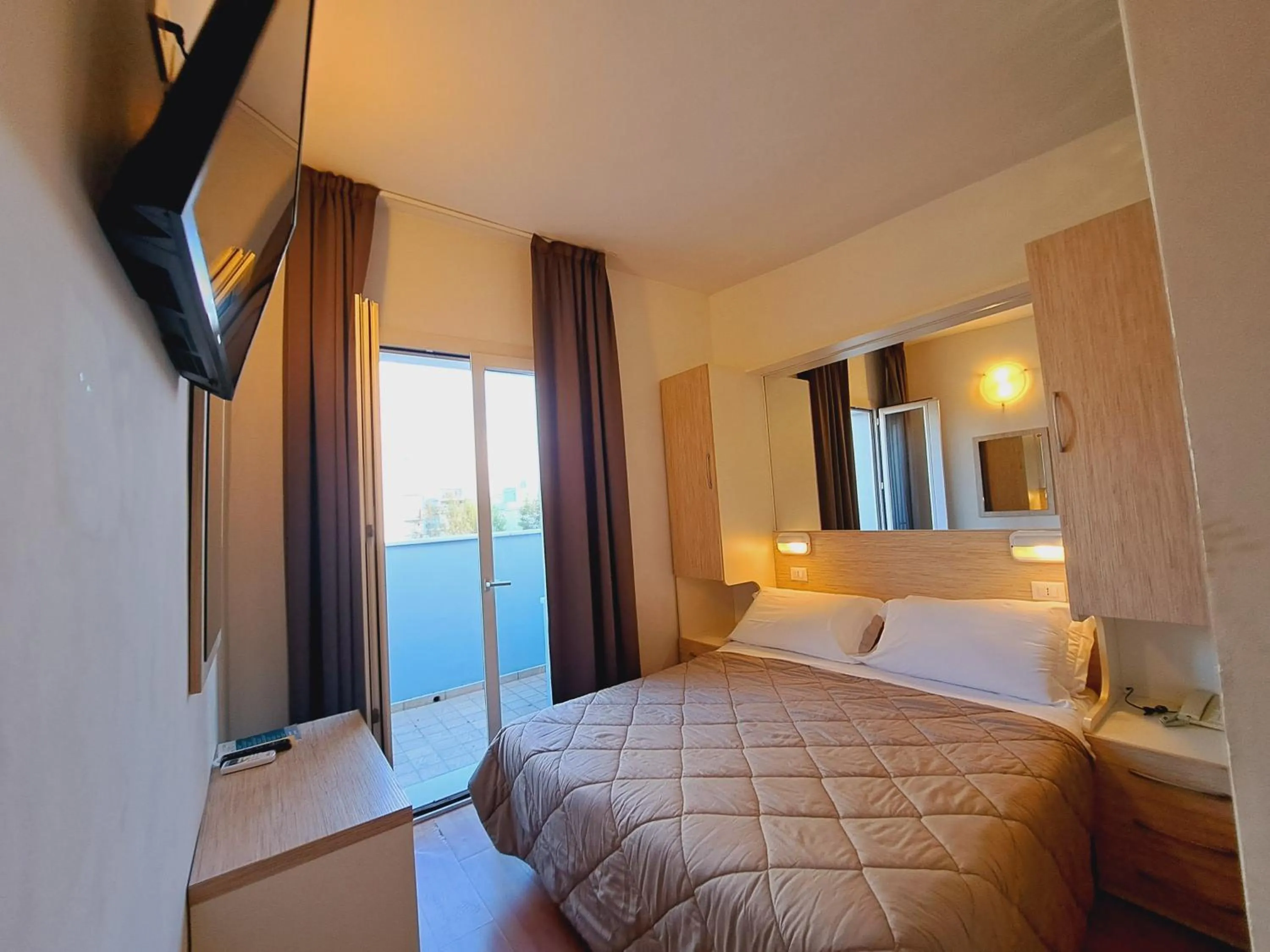 Bed in Hotel Butterfly Wellness & Spa