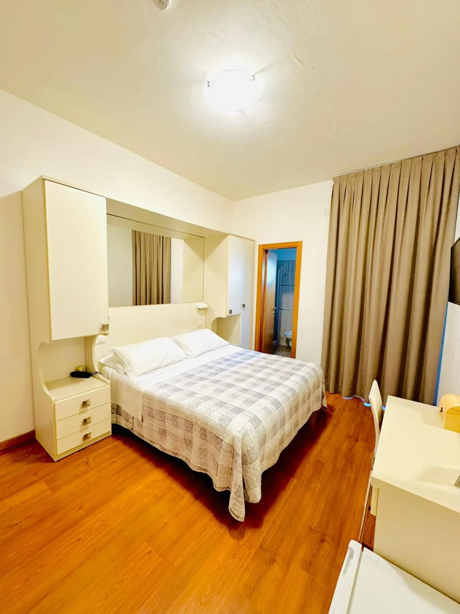 Bed in Hotel Butterfly Wellness & Spa