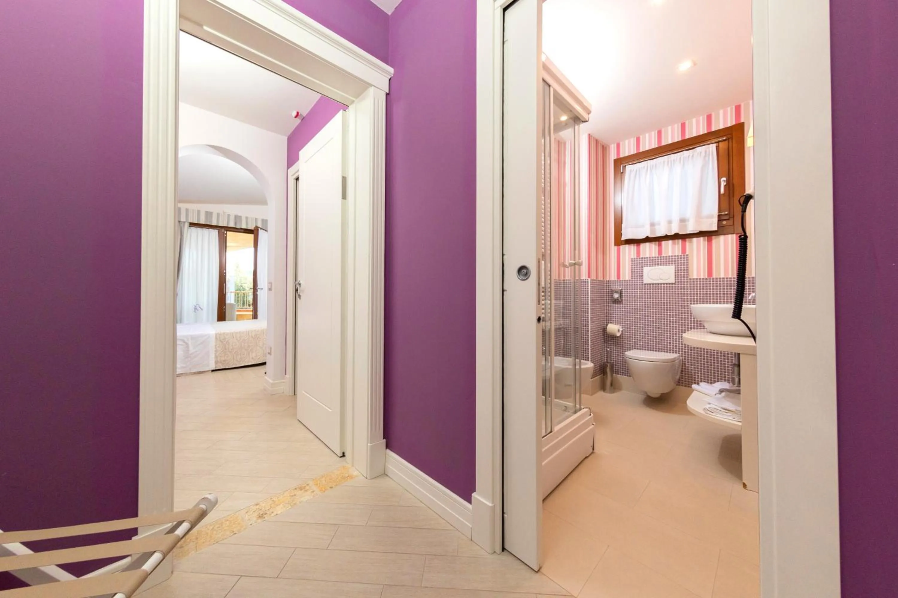 Bedroom in Hotel Residence Il Porto