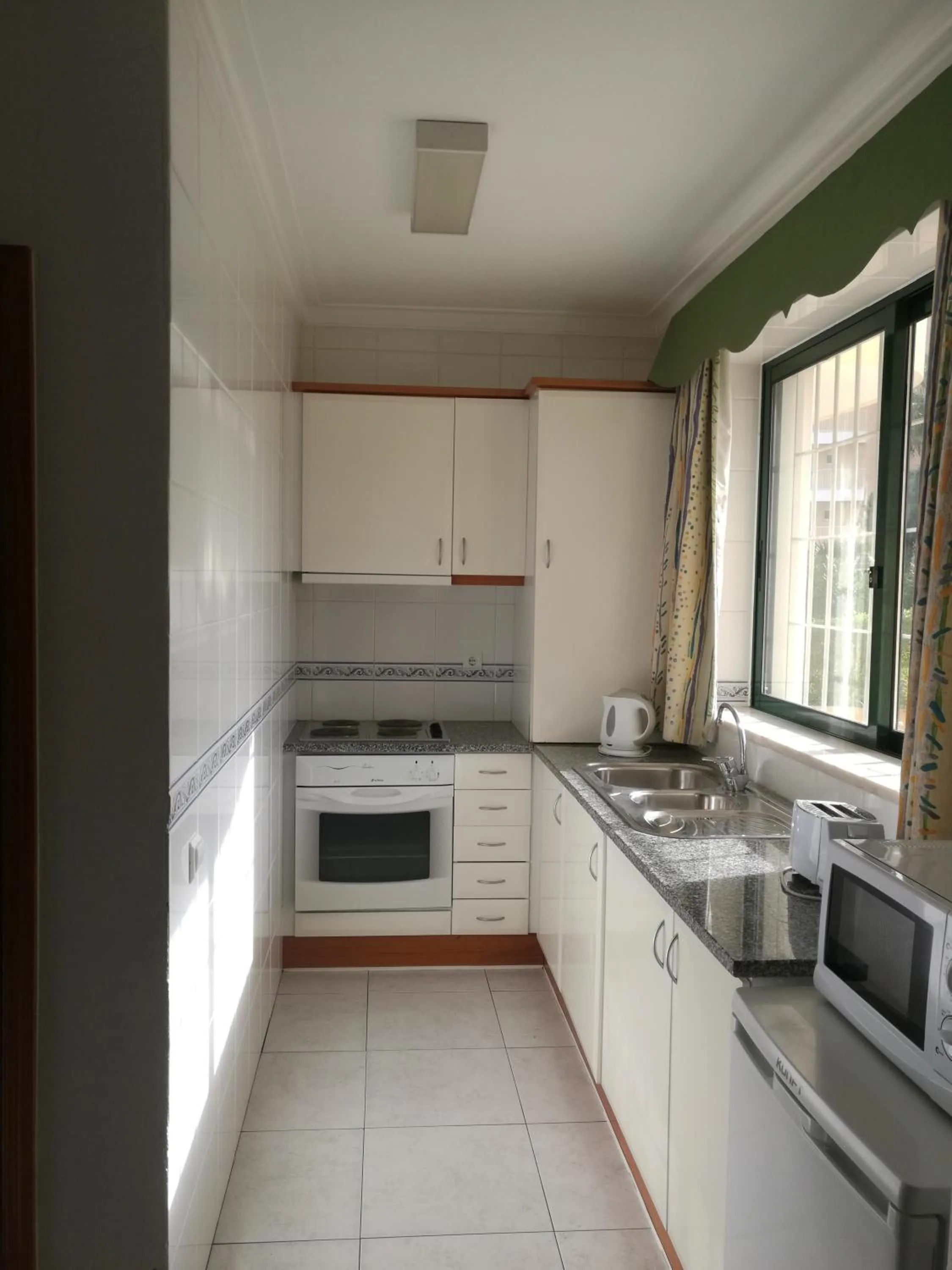 Kitchen or kitchenette in Plaza Real by Atlantichotels