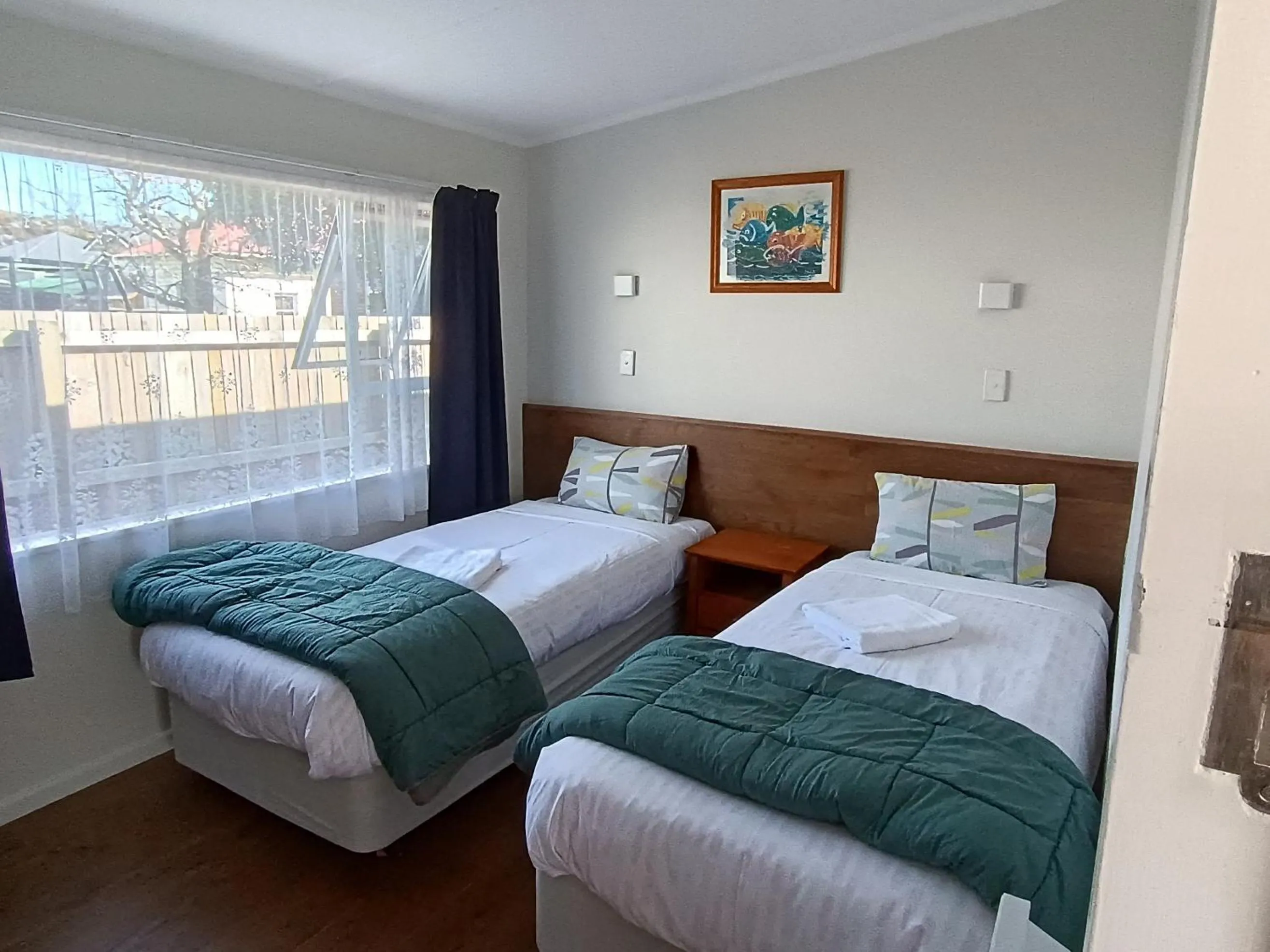 Bed in Bayfield Motel and Apartment