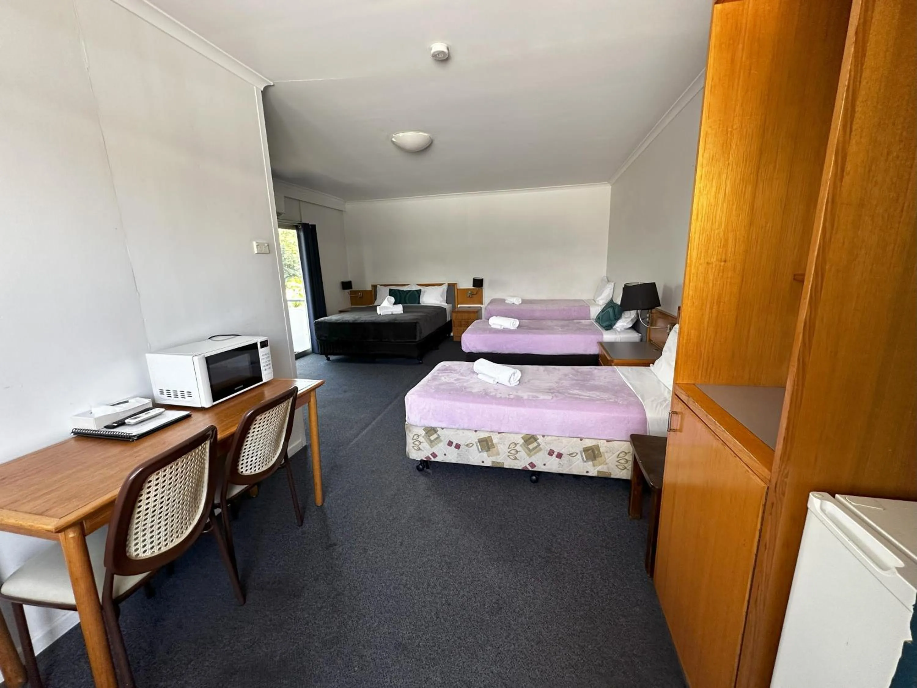 Bed in The Q Motel Rockhampton