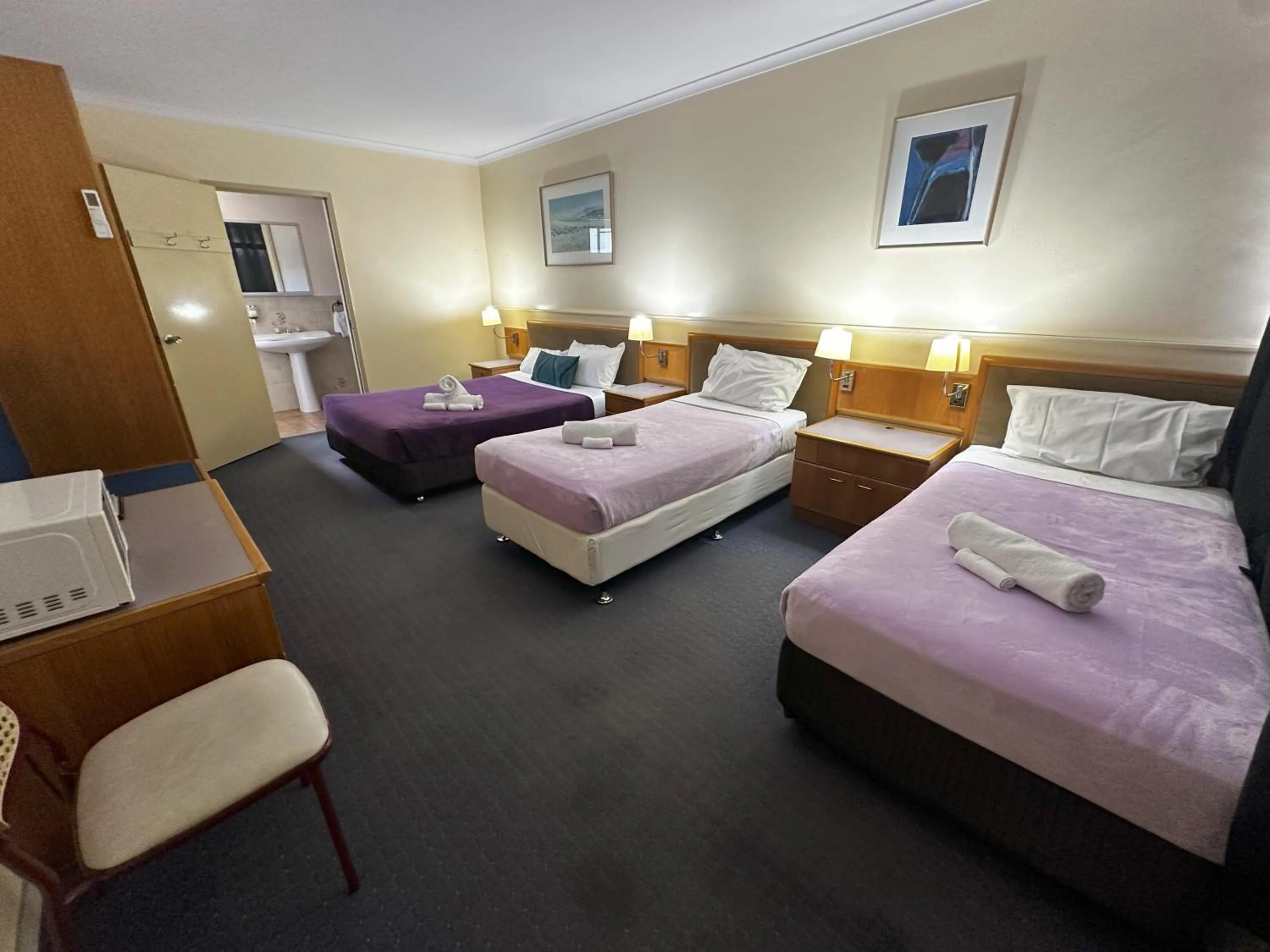 Bed in The Q Motel Rockhampton