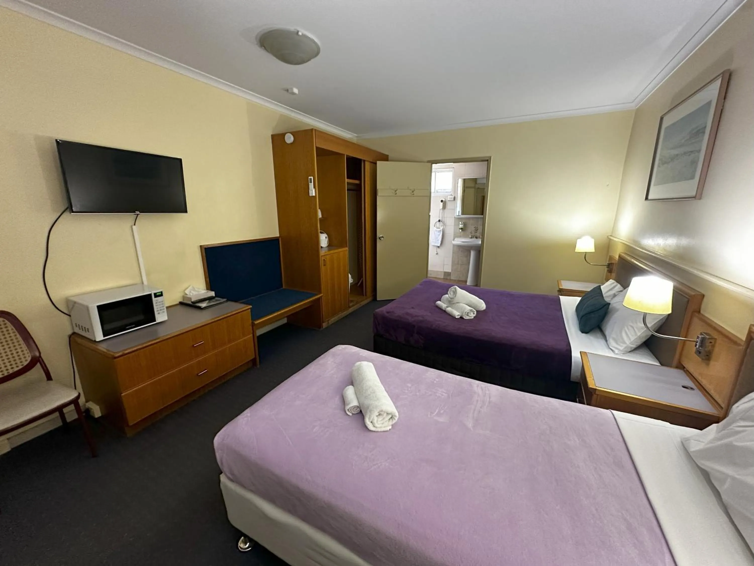 Bed in The Q Motel Rockhampton