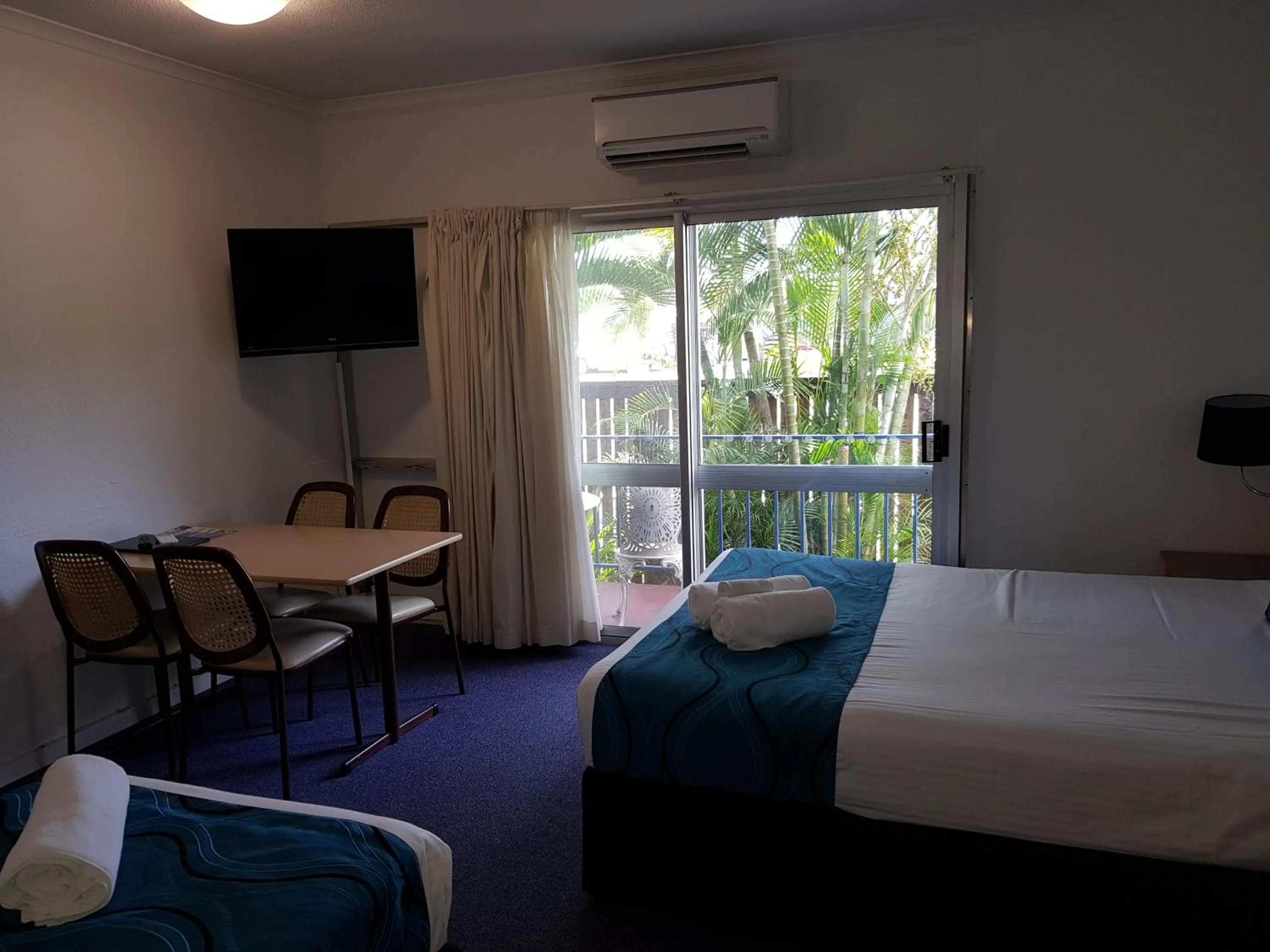 Bed in The Q Motel Rockhampton