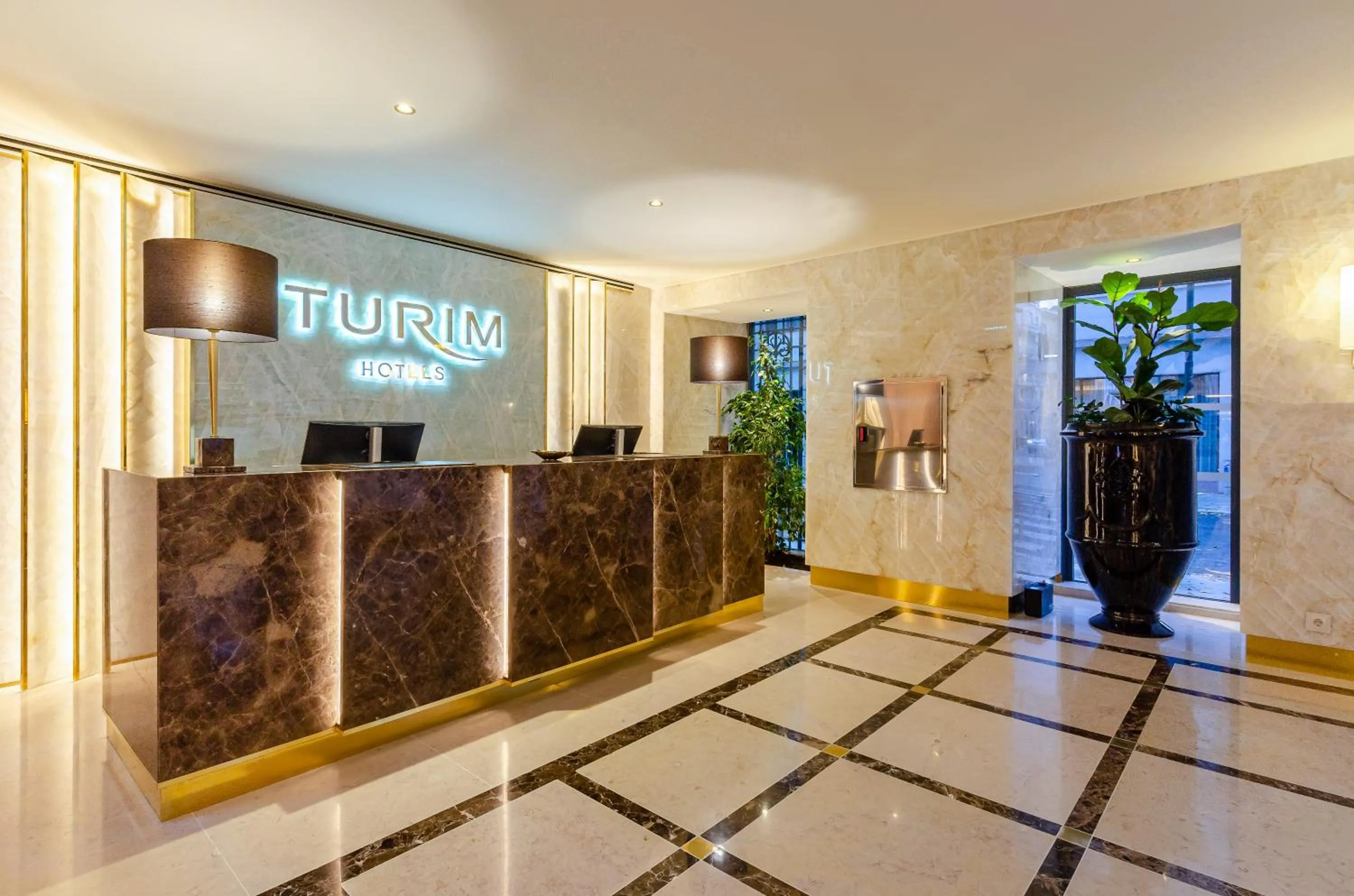 Lobby or reception in TURIM Lisboa Hotel