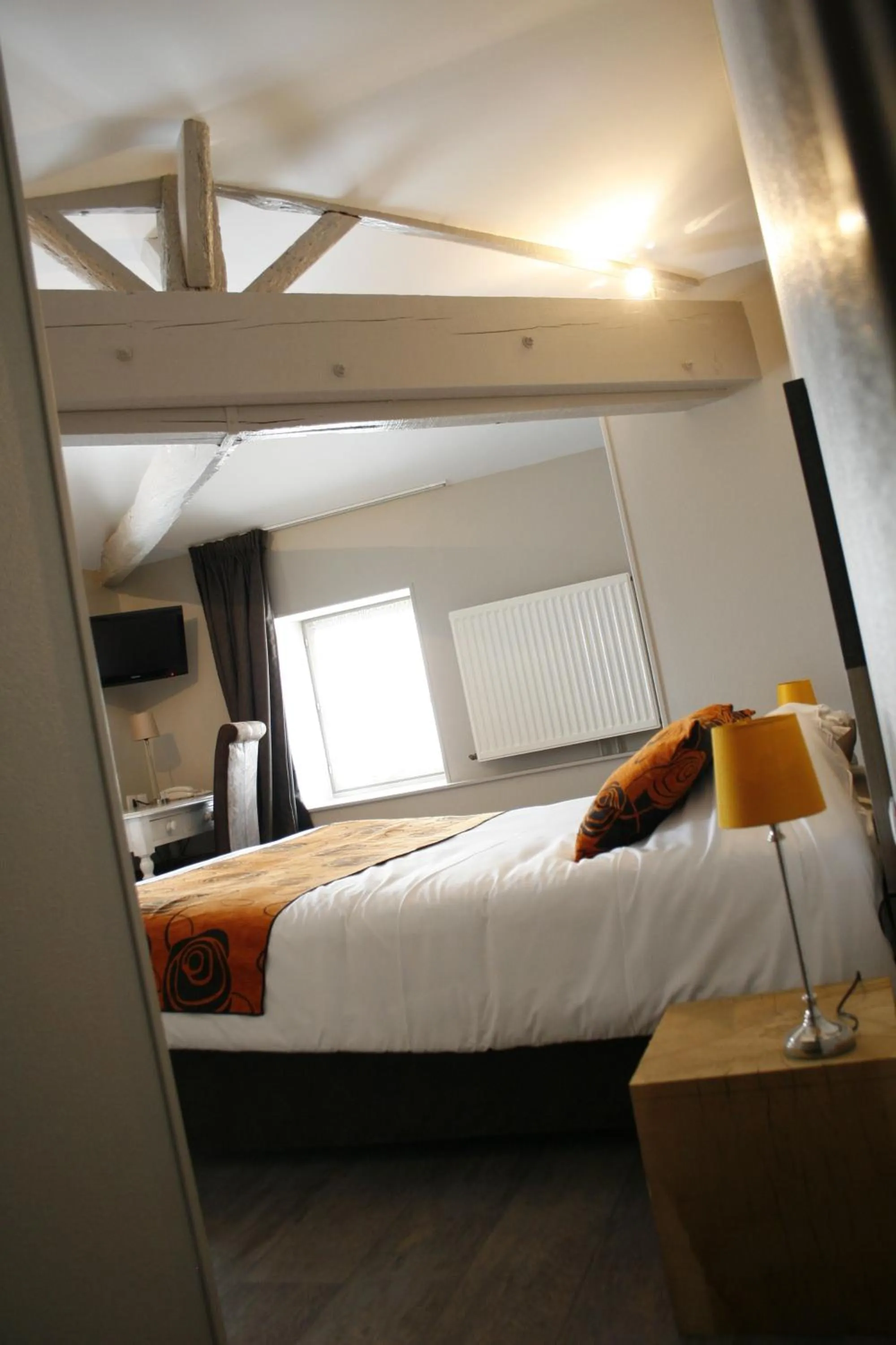Photo of the whole room, Bed in Logis Hostellerie de l'Abbaye