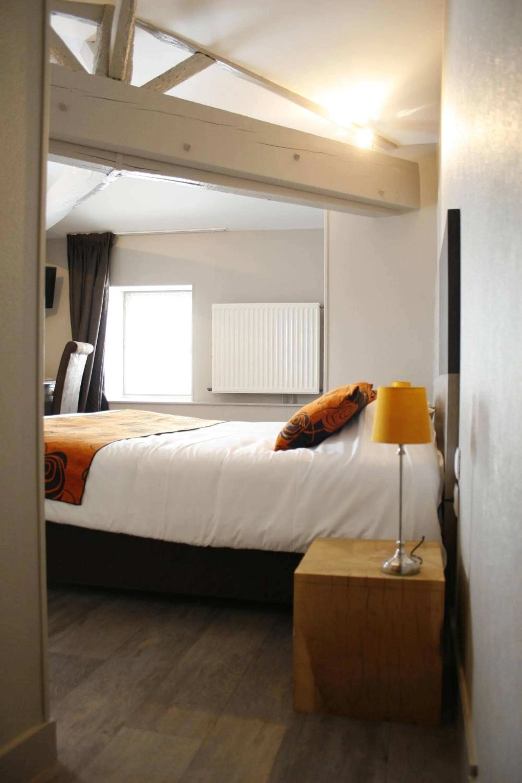 Photo of the whole room, Bed in Logis Hostellerie de l'Abbaye