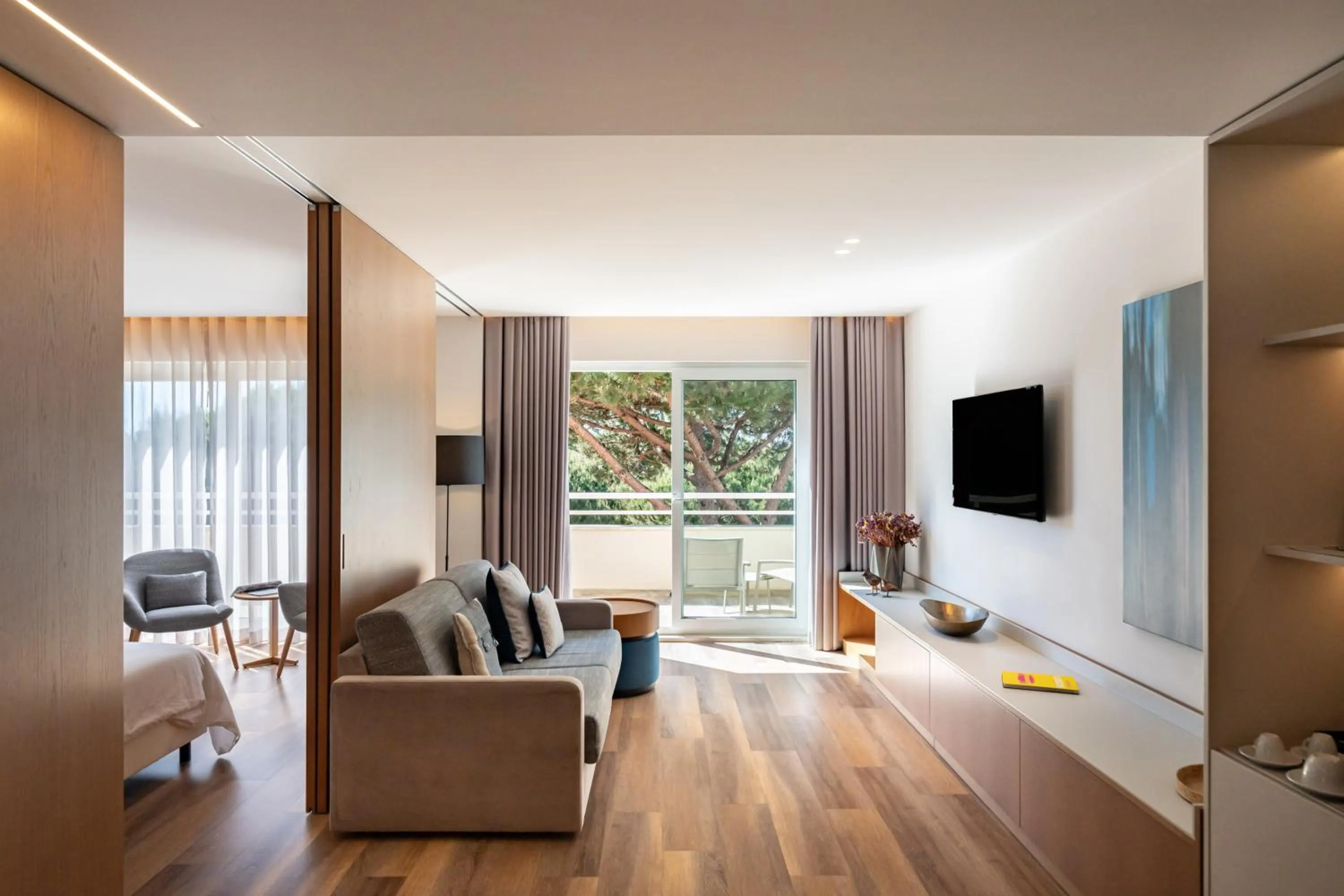 Communal lounge/ TV room in Onyria Quinta da Marinha Hotel