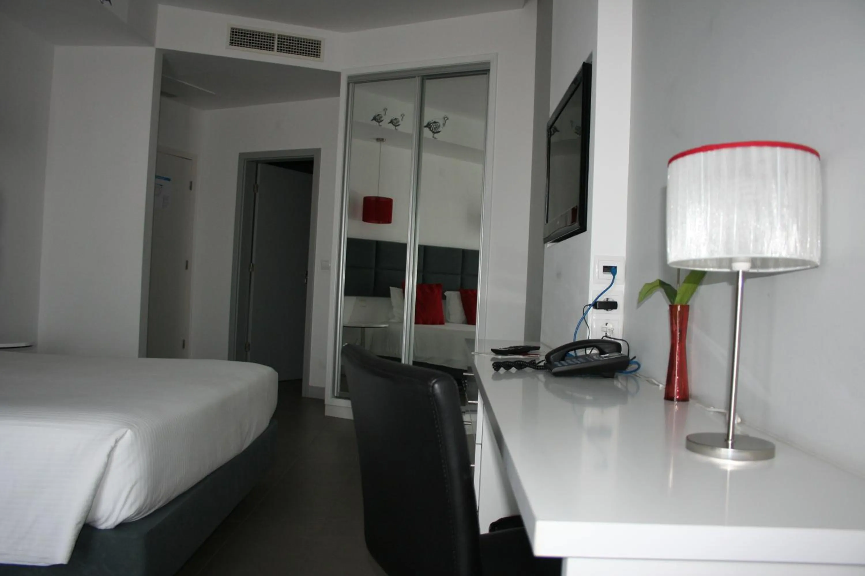 Seating area, Bed in Rossio Hotel