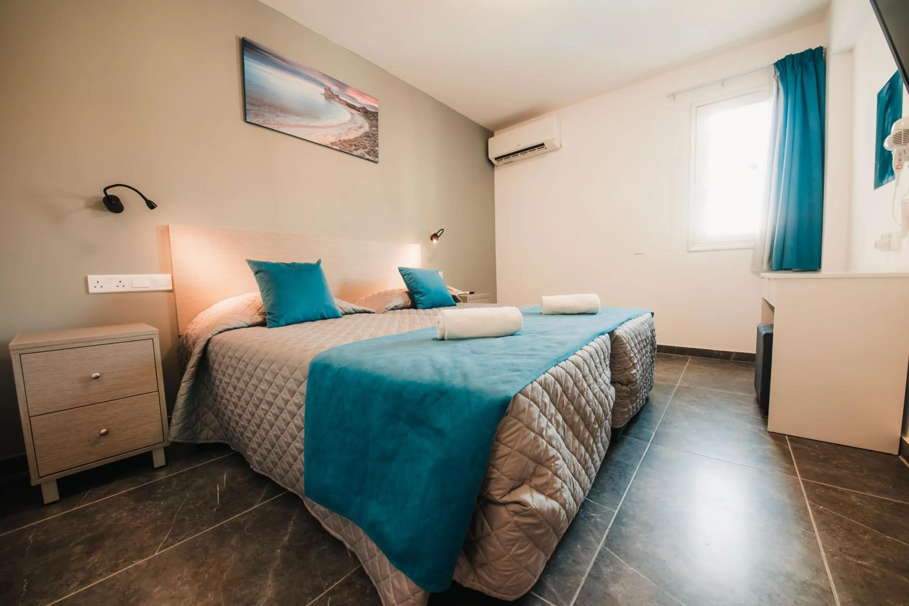 Bed in A Maos Hotel Apartments