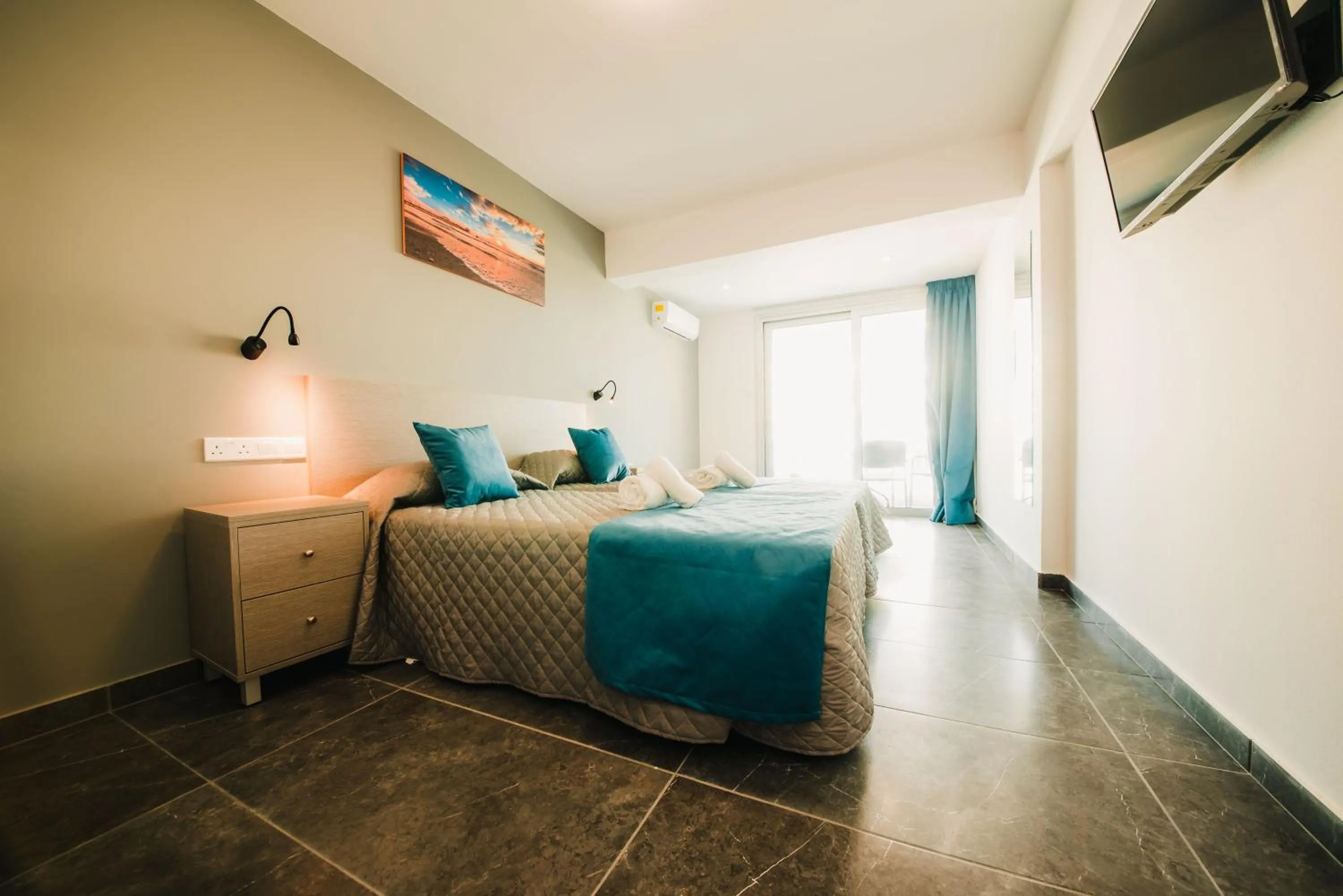 Bed in A Maos Hotel Apartments