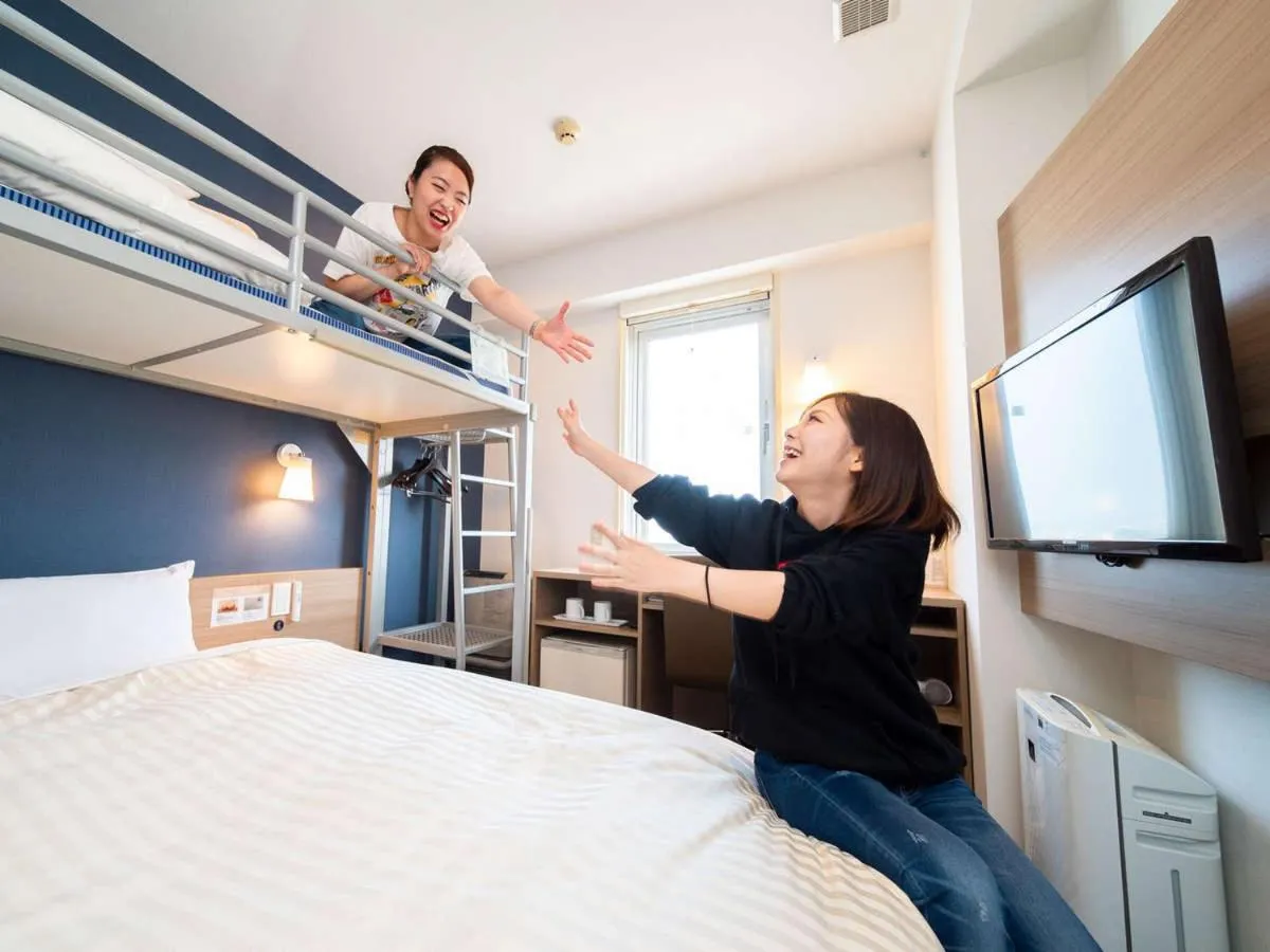 Bed in Super Hotel Hachinohe Tennen Onsen