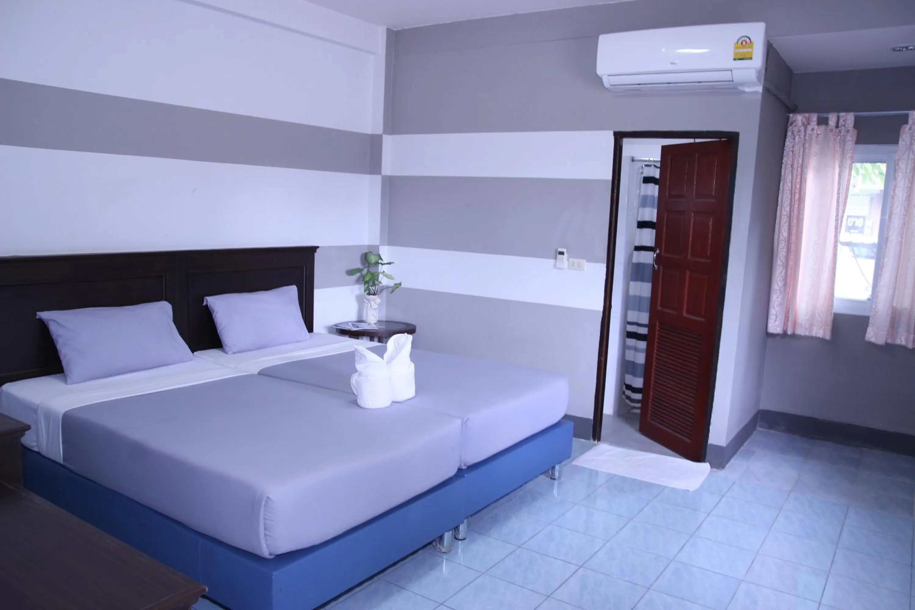 Bed in Pimann Place Hotel