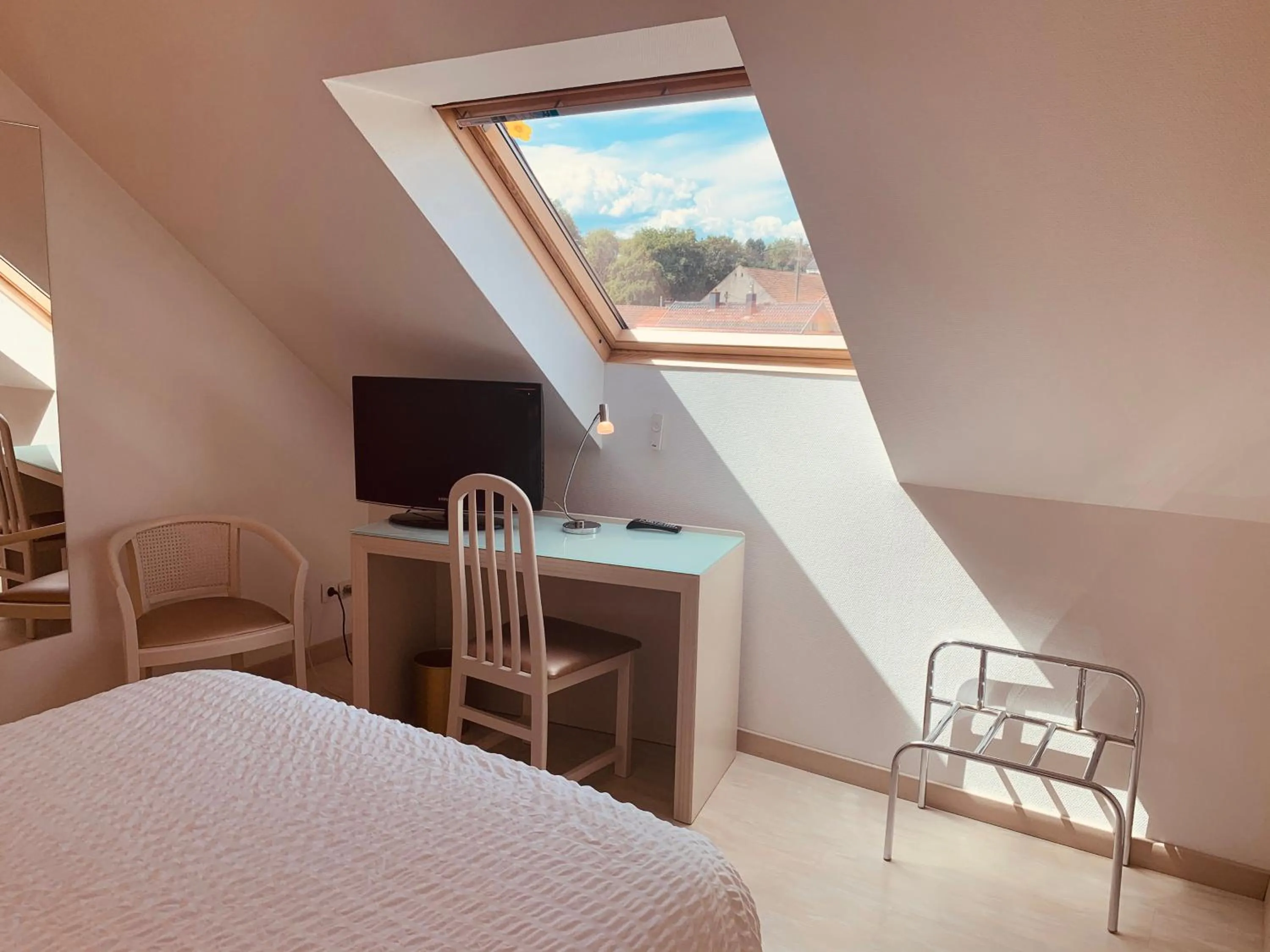 Photo of the whole room, Bed in Logis Hôtel Restaurant Au Lion Rouge