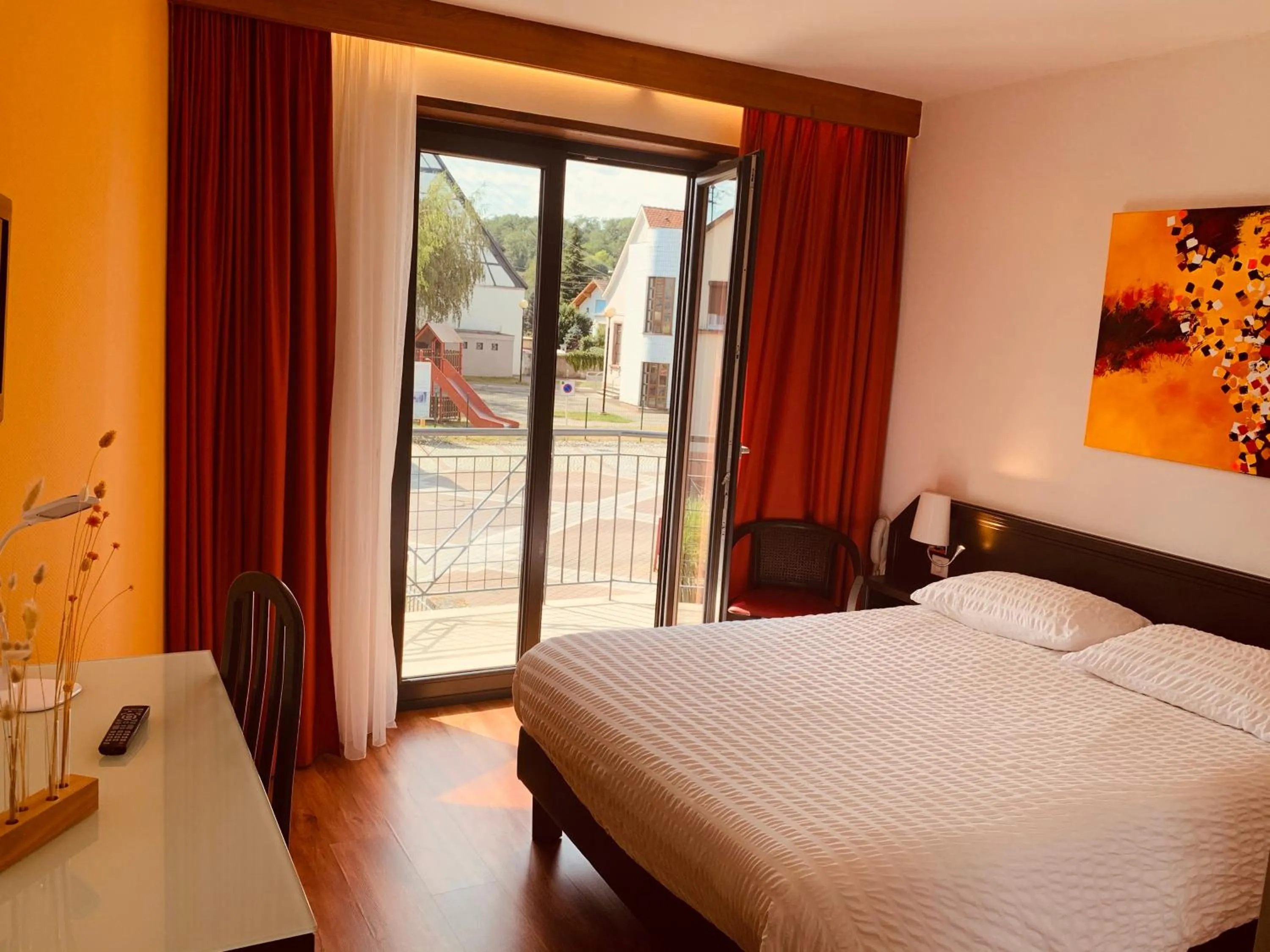 Photo of the whole room, Bed in Logis Hôtel Restaurant Au Lion Rouge