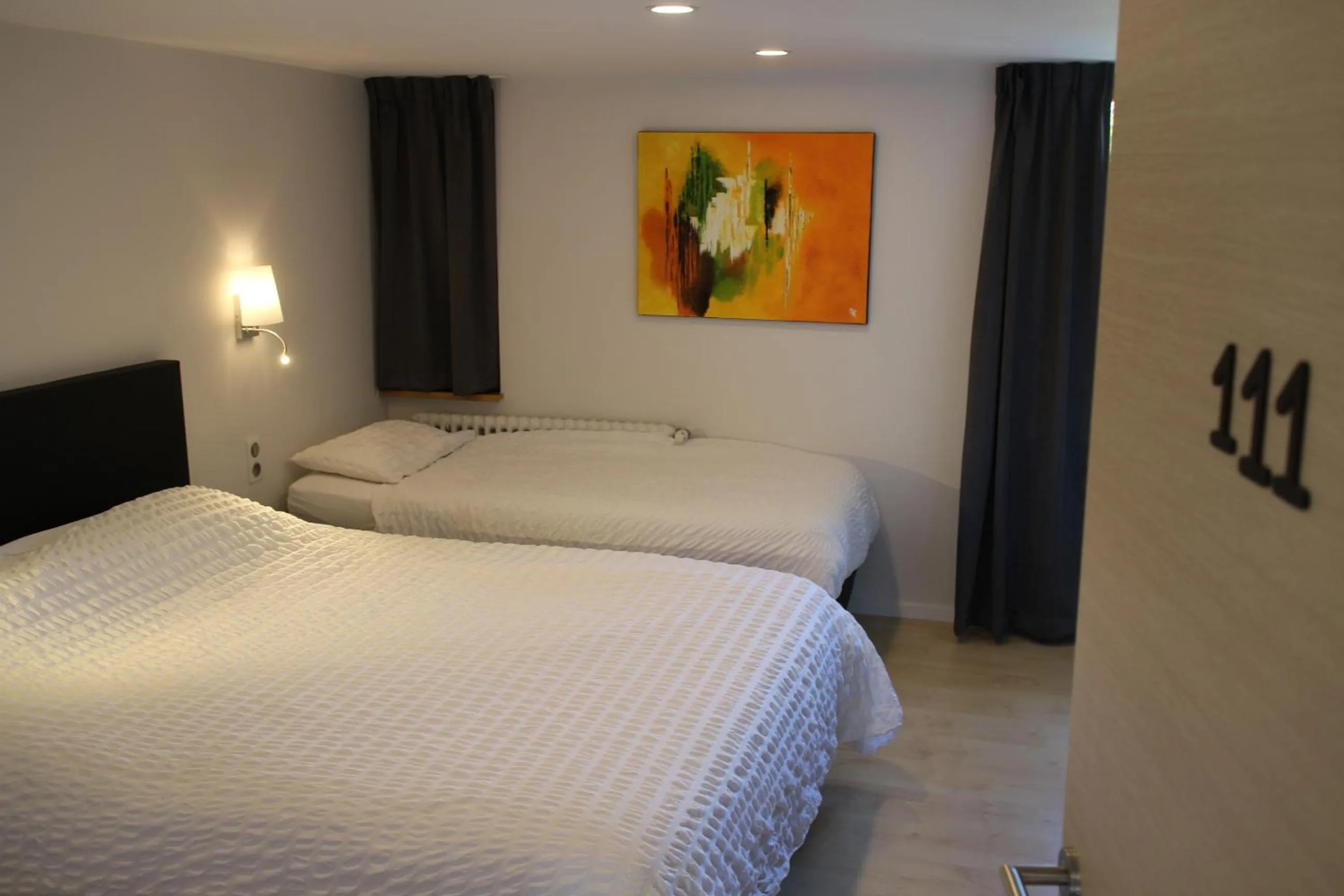 Photo of the whole room, Bed in Logis Hôtel Restaurant Au Lion Rouge