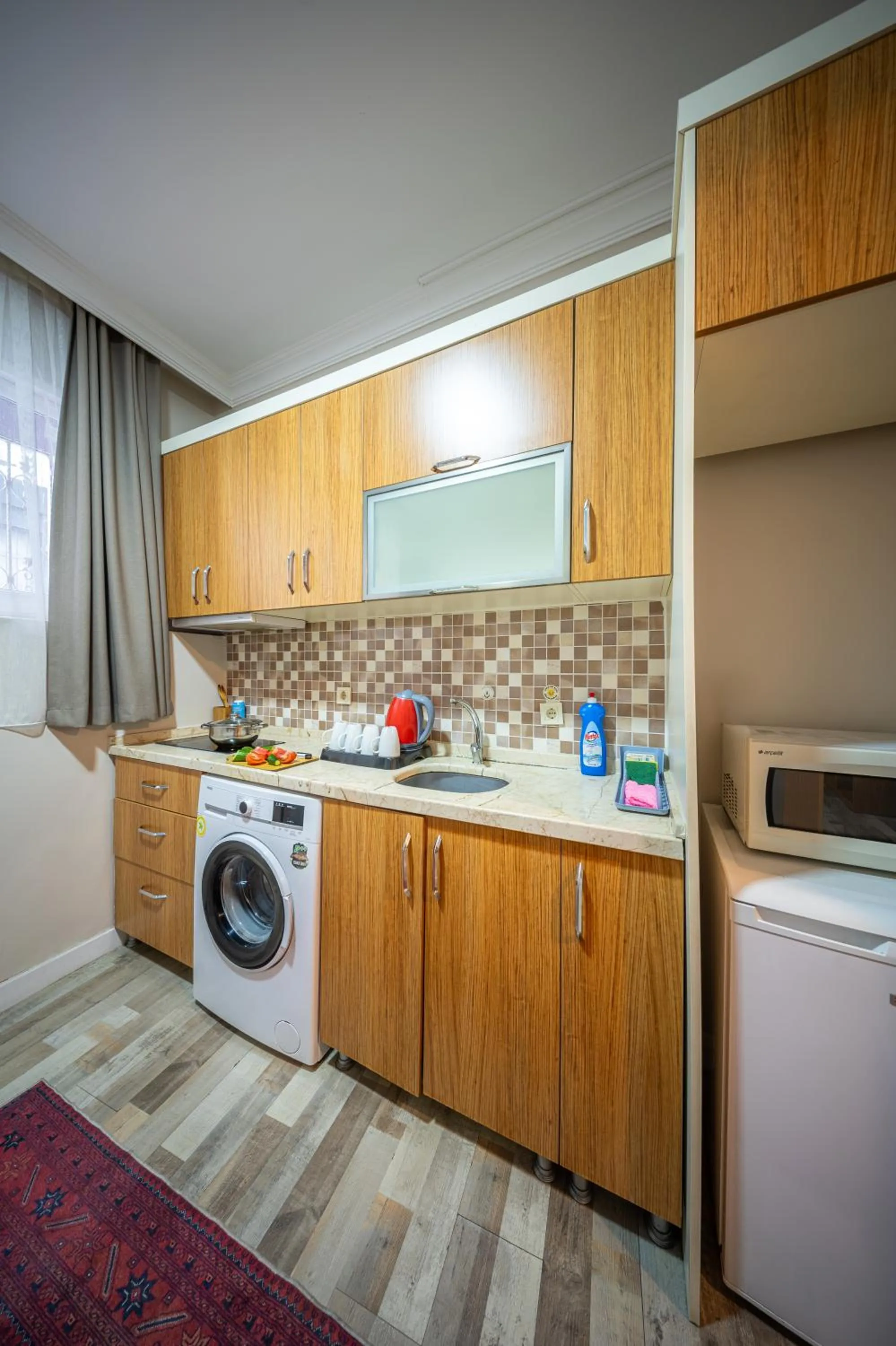Kitchen or kitchenette in Feyza Apart