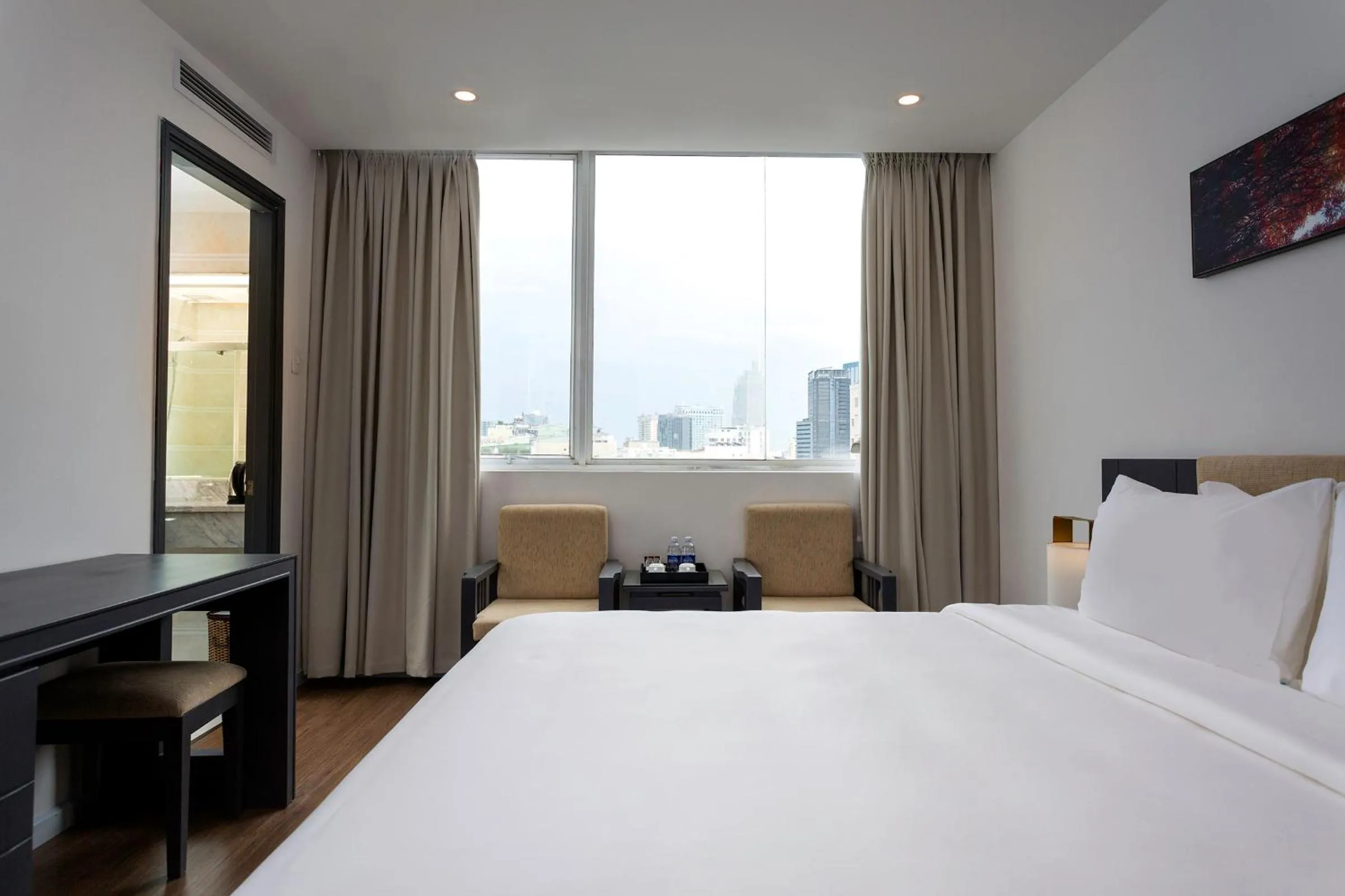 Photo of the whole room, Bed in Calista Sai Gon Hotel
