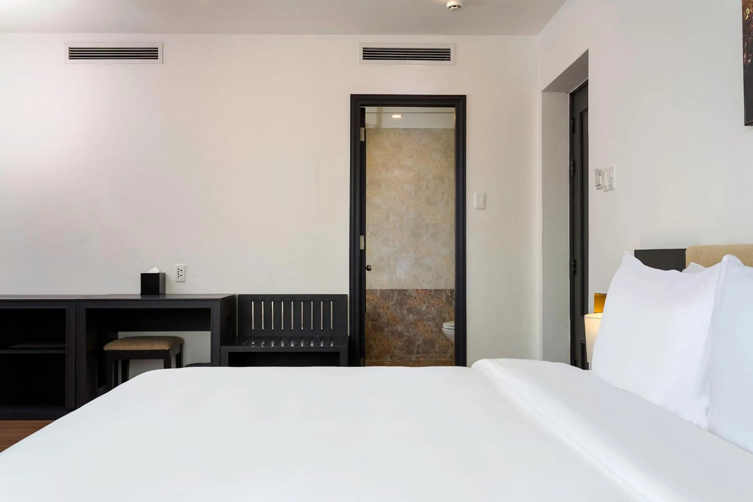 Photo of the whole room, Bed in Calista Sai Gon Hotel