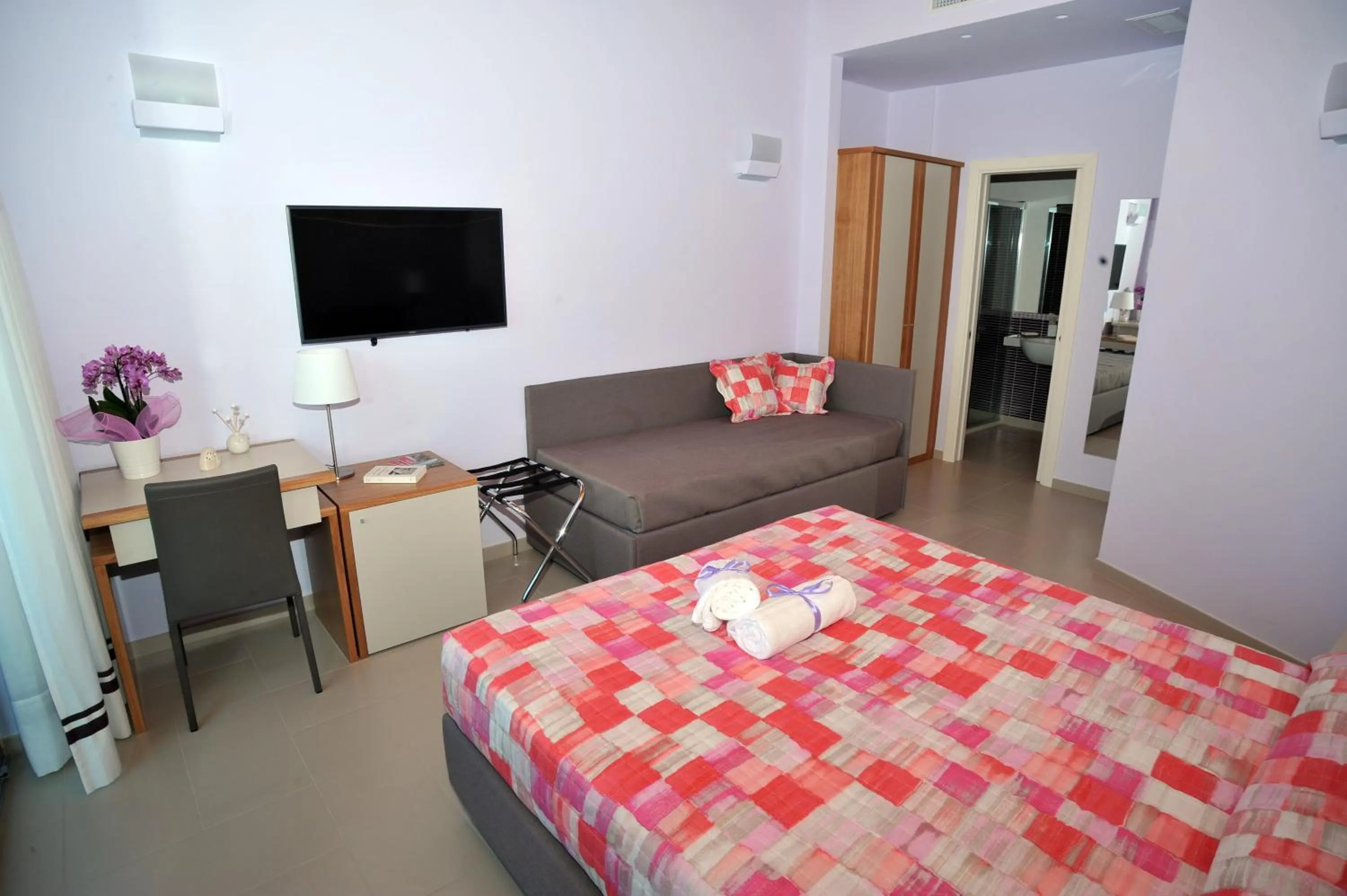 Bed in Villa Paradise Resort