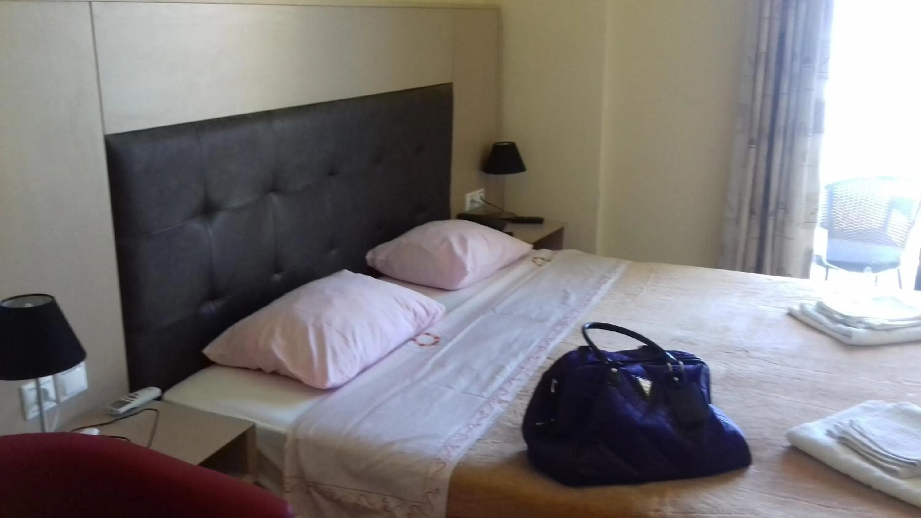 Bed in Parthenon Hotel