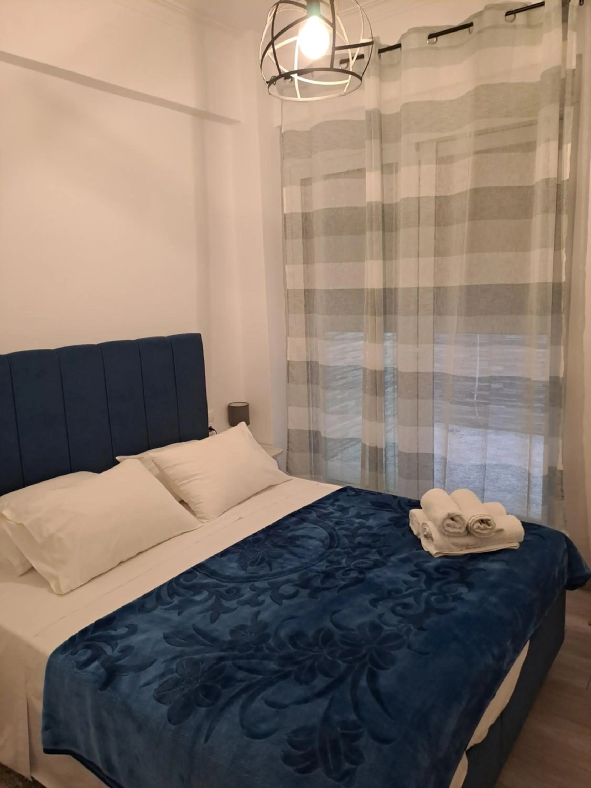 Bed in Parthenon Hotel