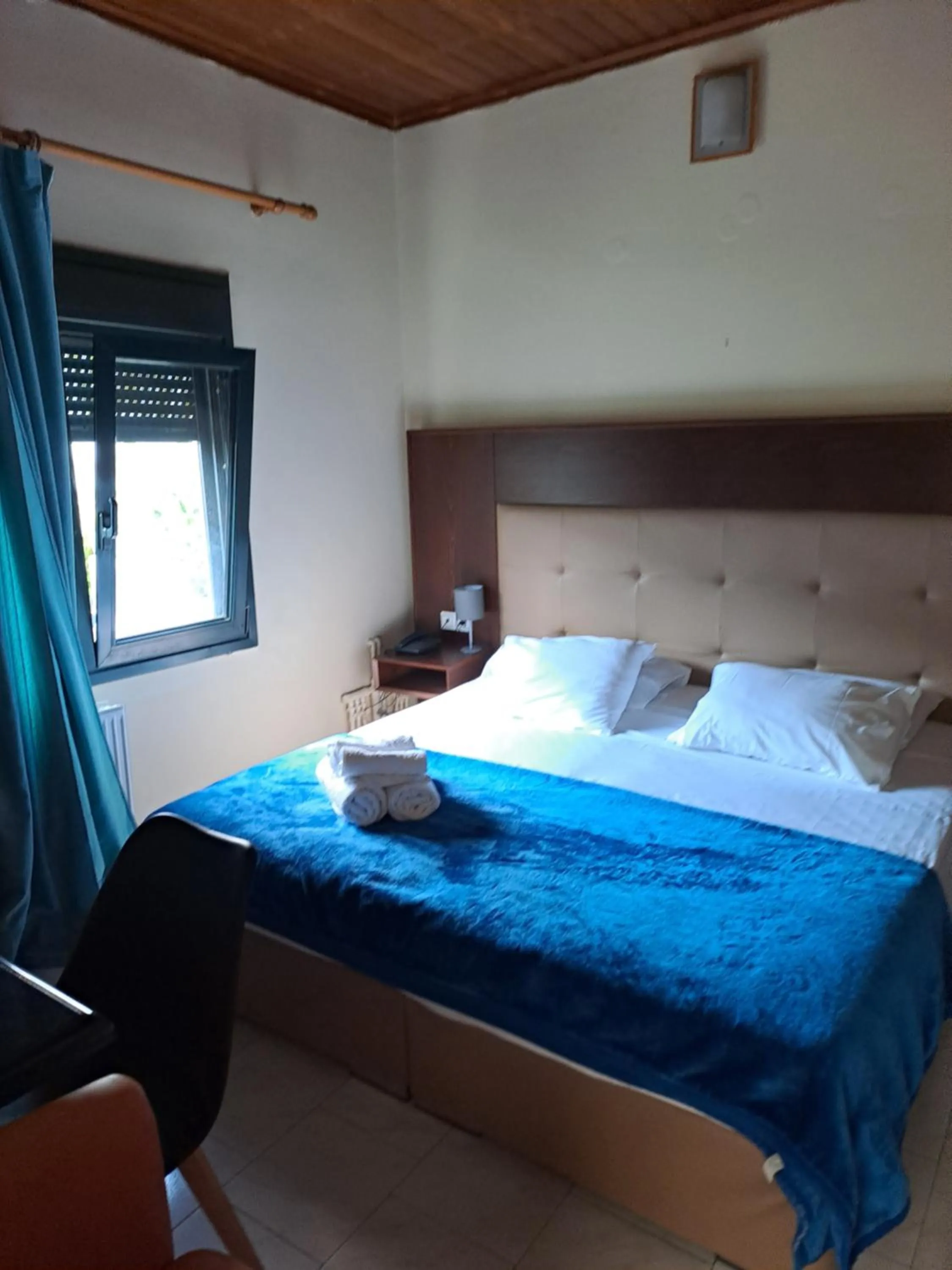 Bed in Parthenon Hotel