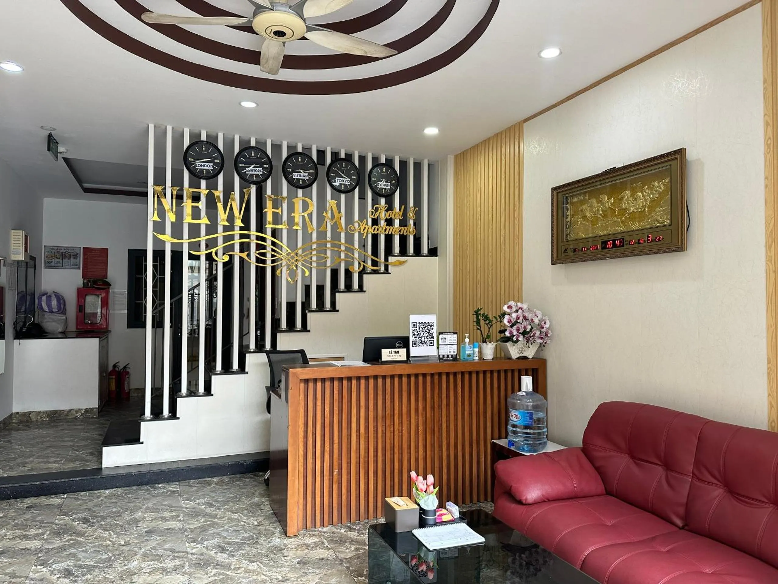 Property logo or sign in New Era Hotel & Apartments