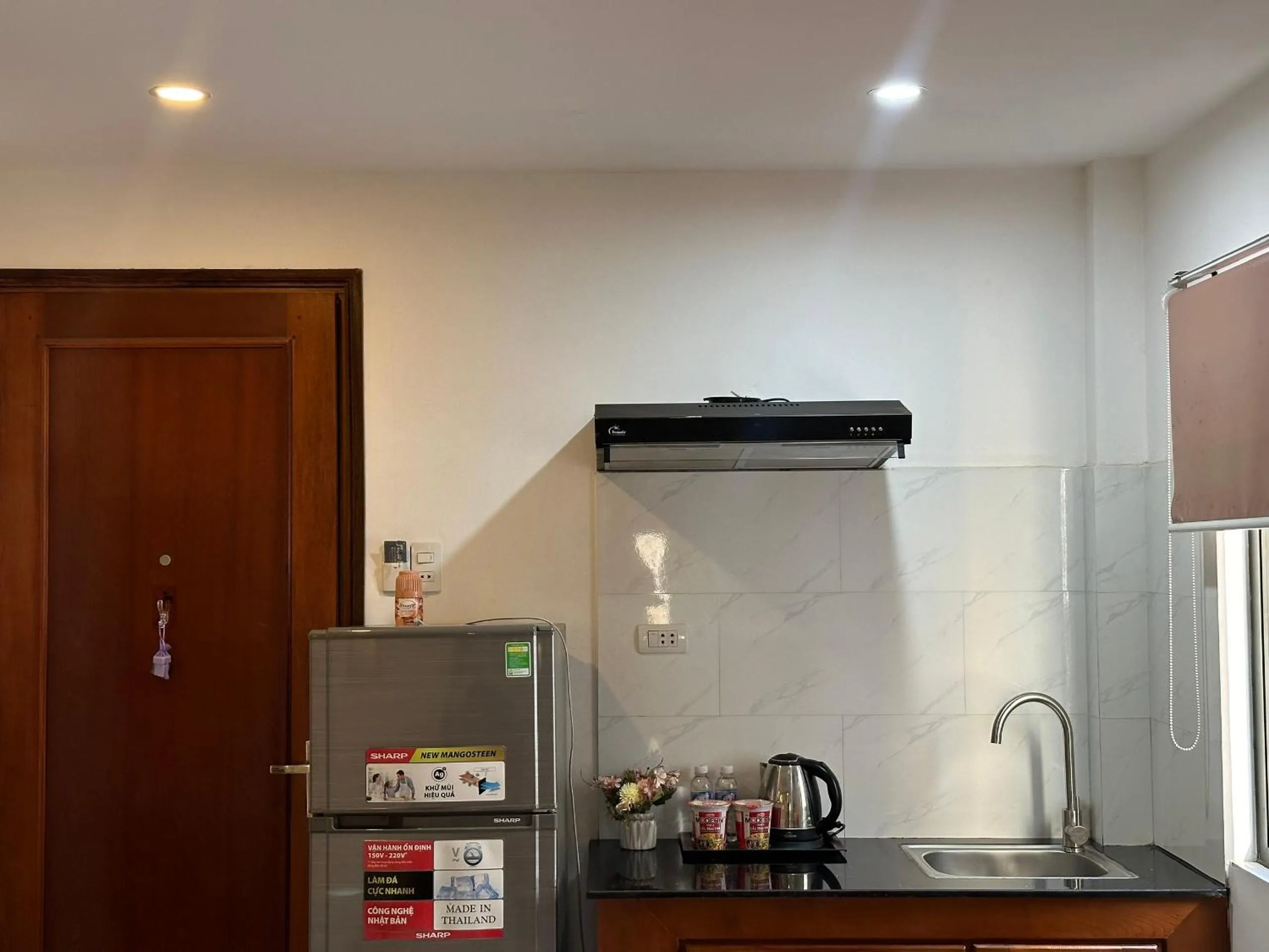 Seating area in New Era Hotel & Apartments