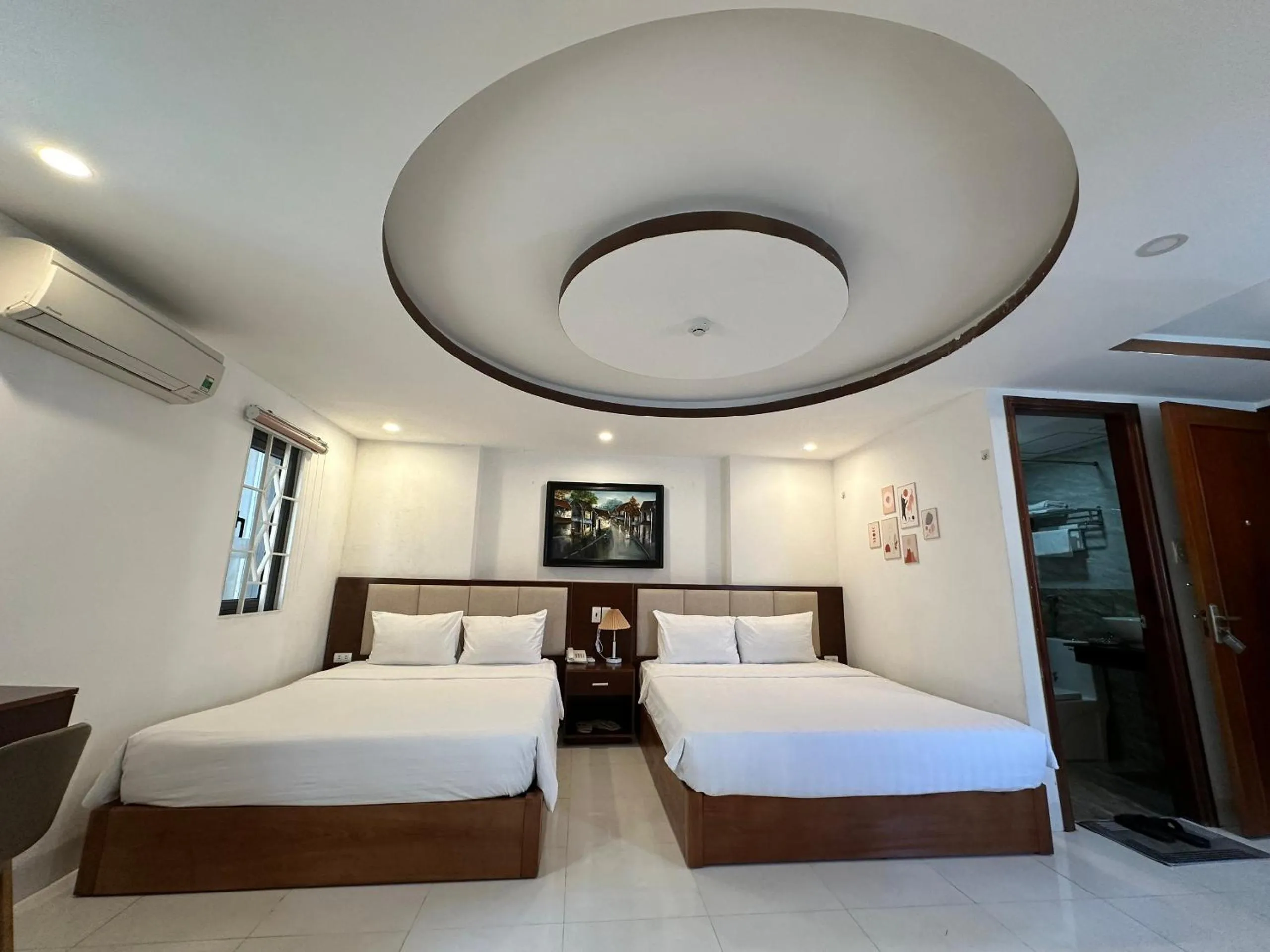 Bed in New Era Hotel & Apartments