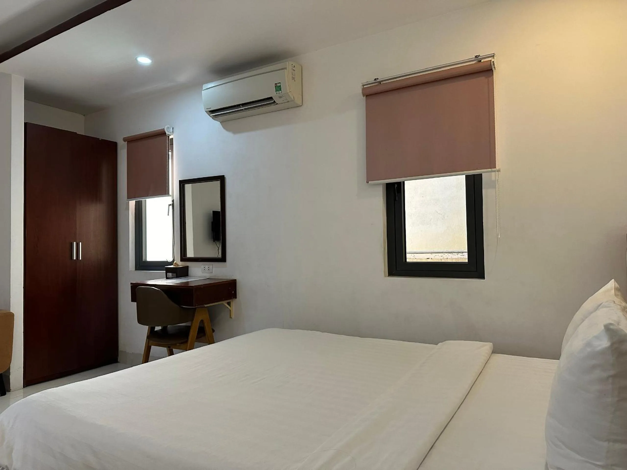 Bed in New Era Hotel & Apartments