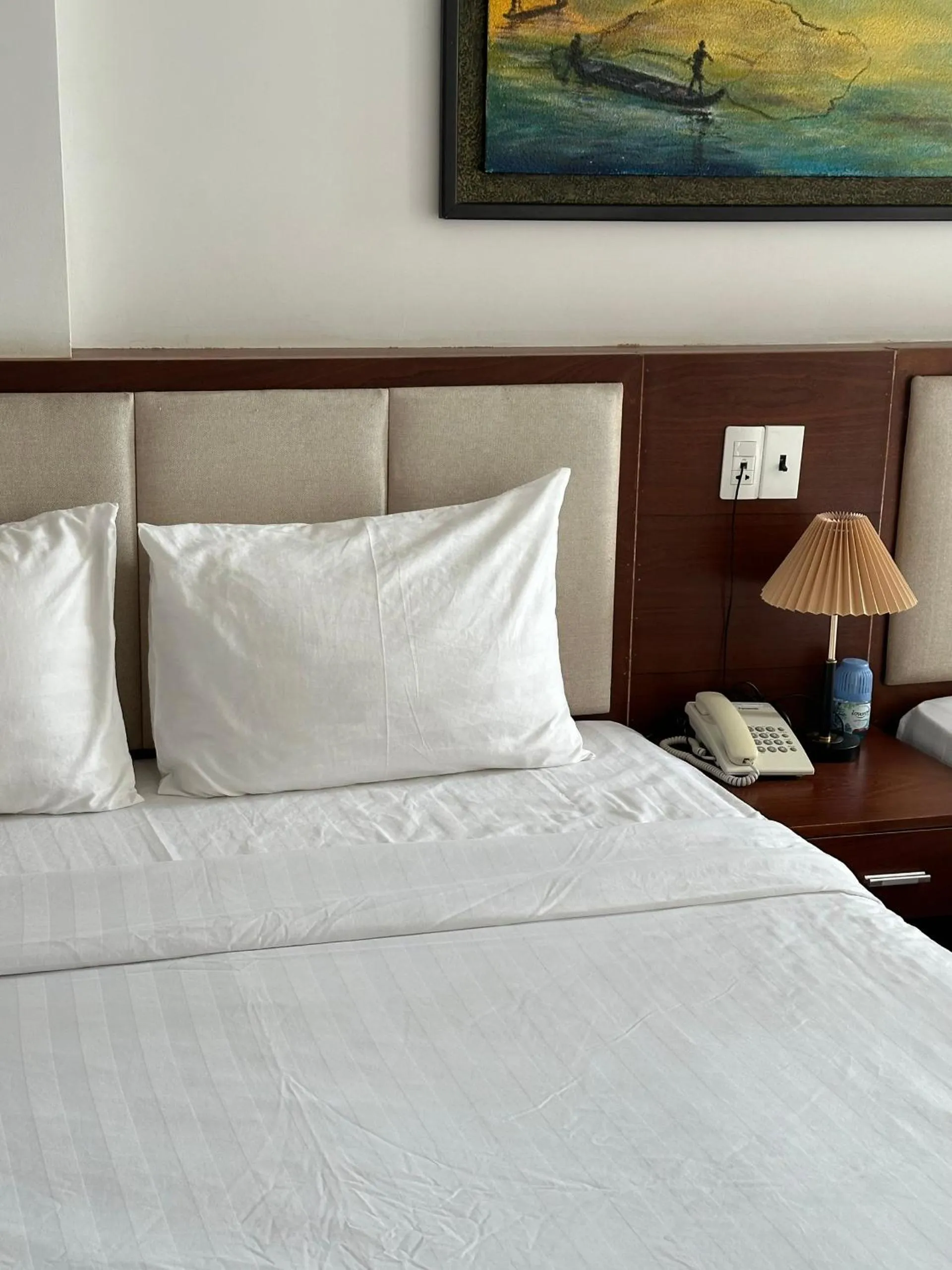 Bed in New Era Hotel & Apartments