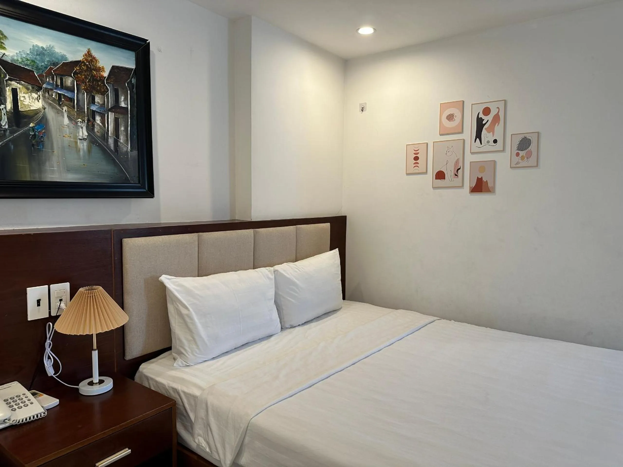 Bed in New Era Hotel & Apartments